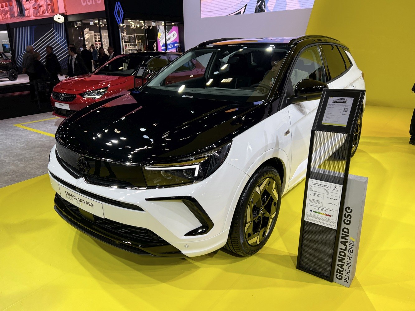 Front and side view of two-tone Opel hybrid SUV