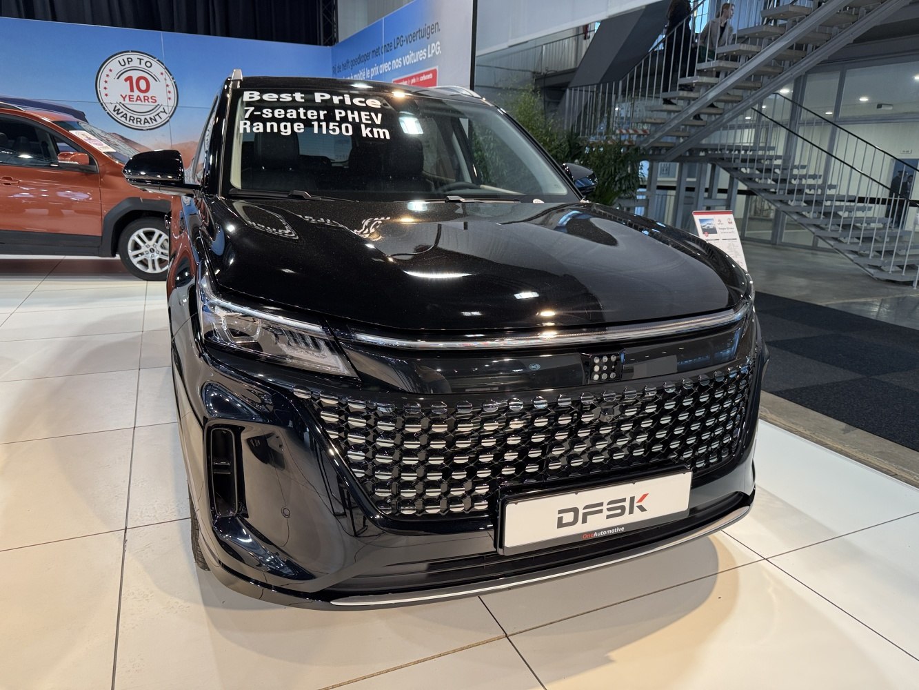 7-seater PHEV front view with LED headlights and distinctive grille
