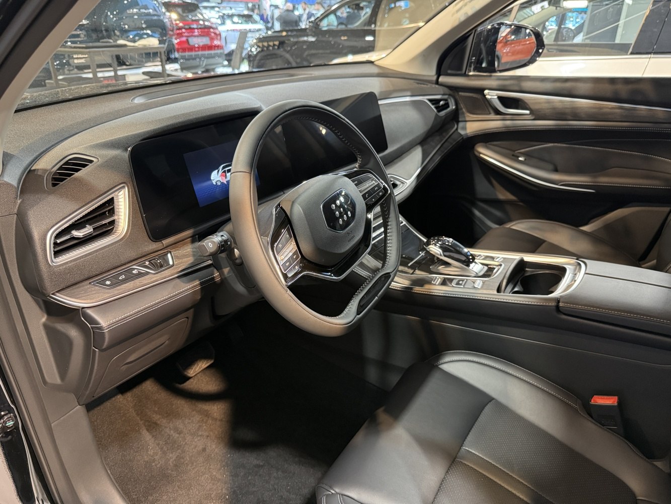 Digital dashboard and leather steering wheel with modern central console