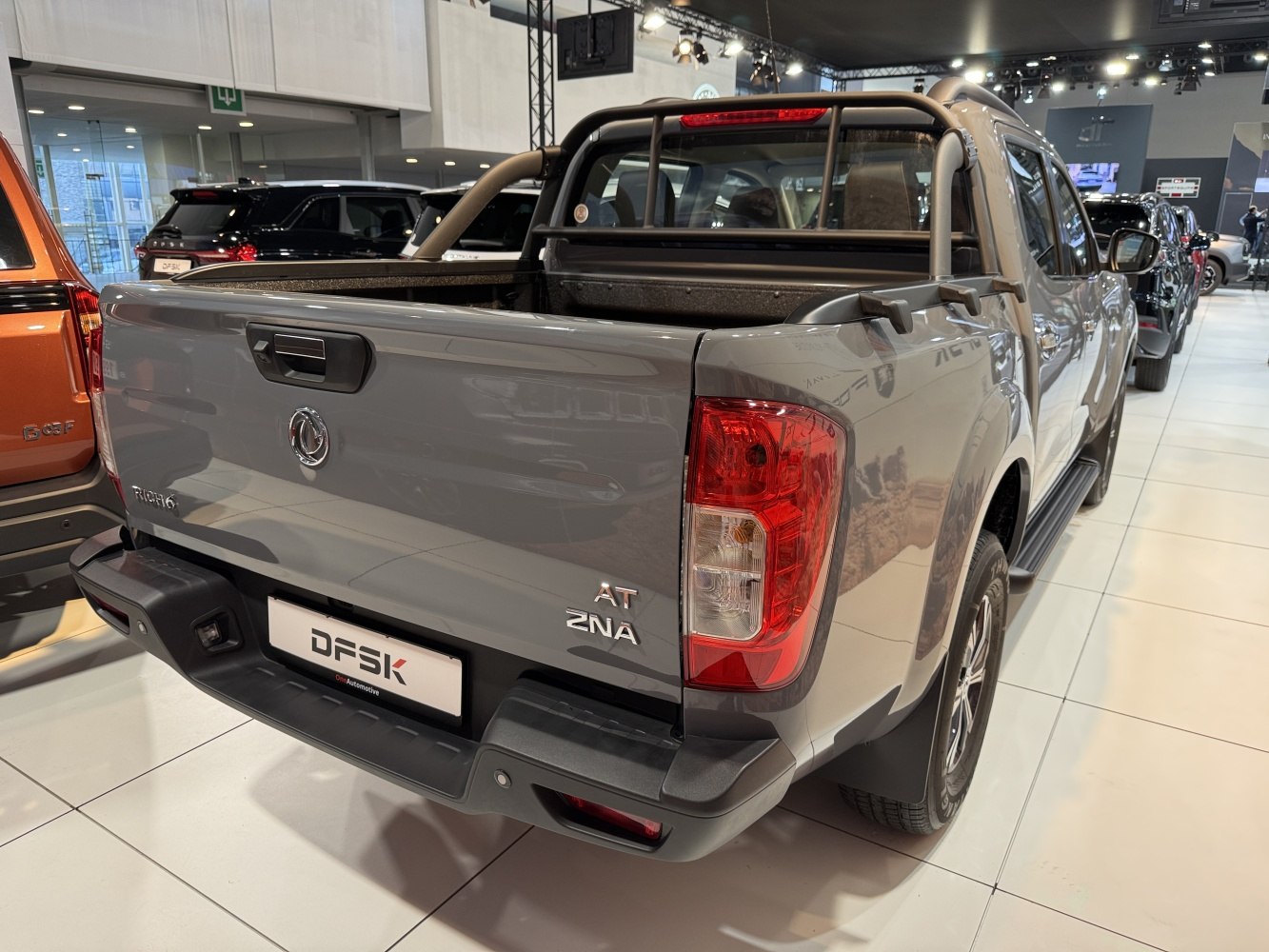 Rear view of double cab pickup with tailgate and roof rack