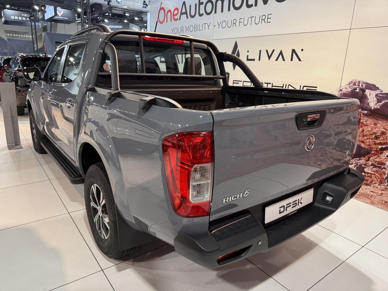 Pickup truck rear bed and taillight design with rugged features.
