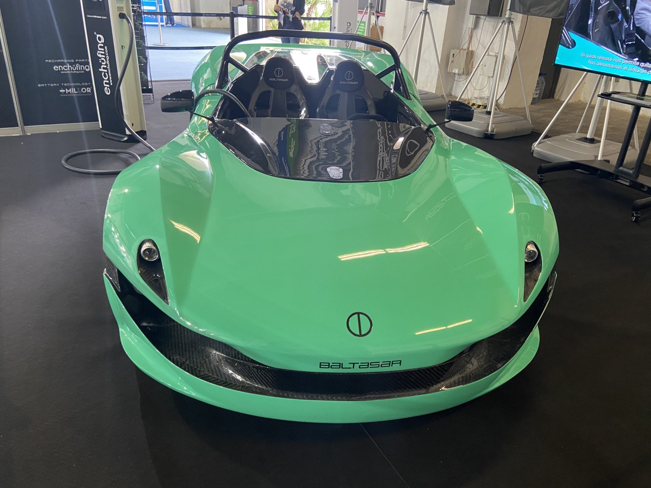 Front view of an open cockpit aerodynamic two-seat roadster