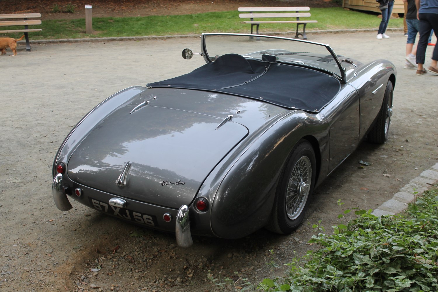 Classic roadster rear with wire wheels and black tonneau cover