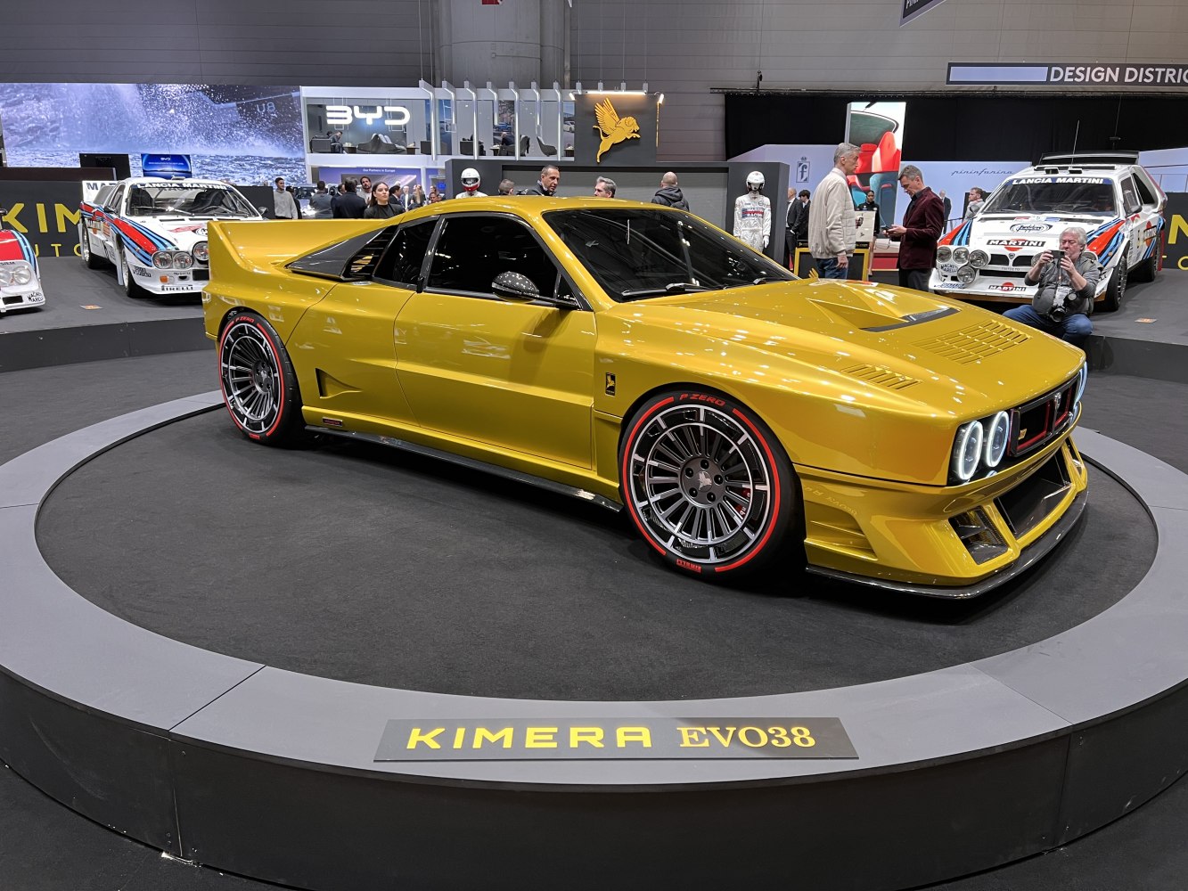 Yellow 2024 sports coupe with retro design and modern wheel accents