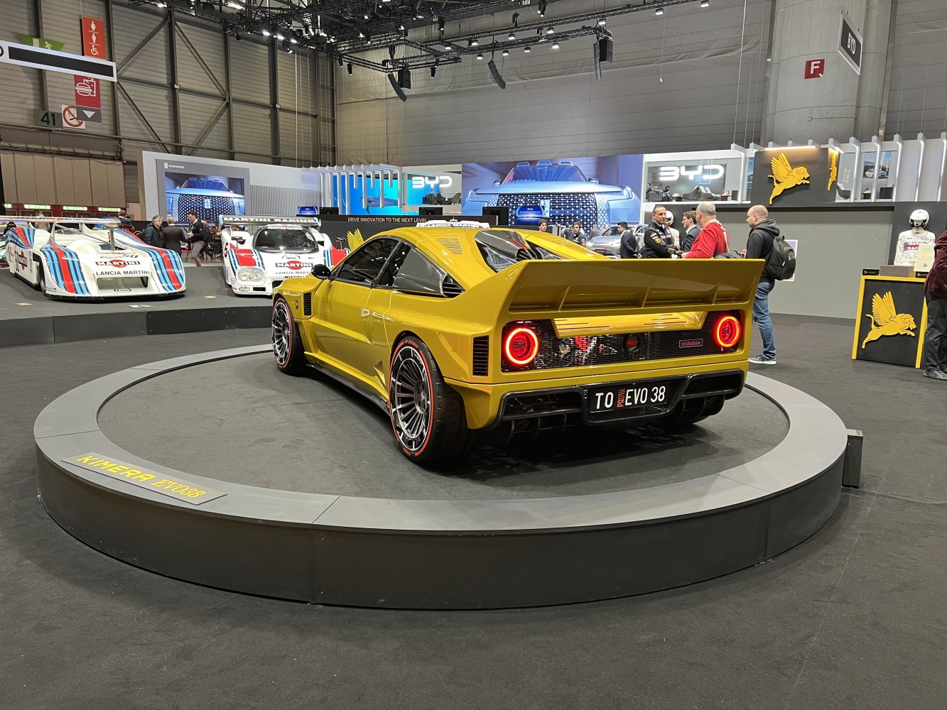 Widebody rear view with large rear wing and circular LED taillights