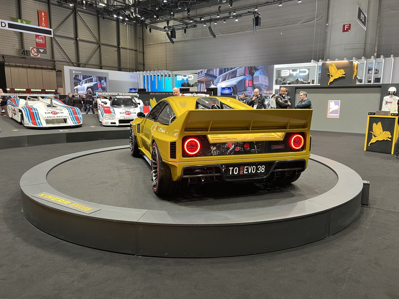 Rear view with large wing and glowing circular tail lights