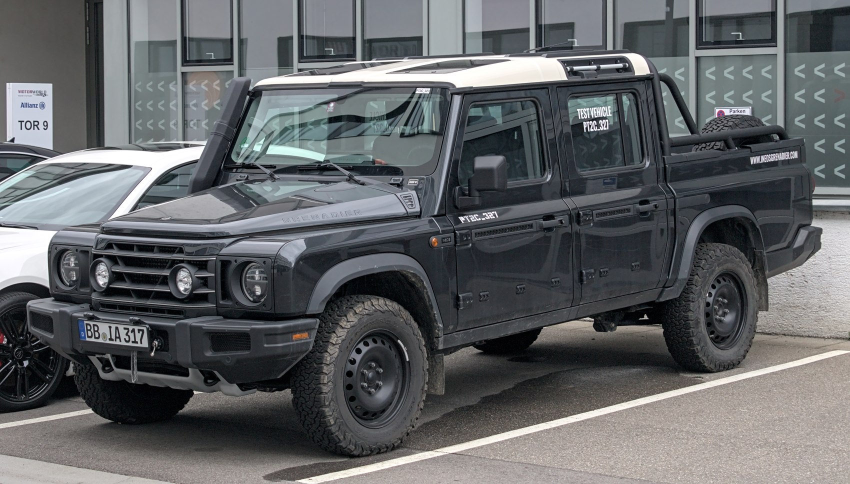 Pickup truck with off-road tires and snorkel
