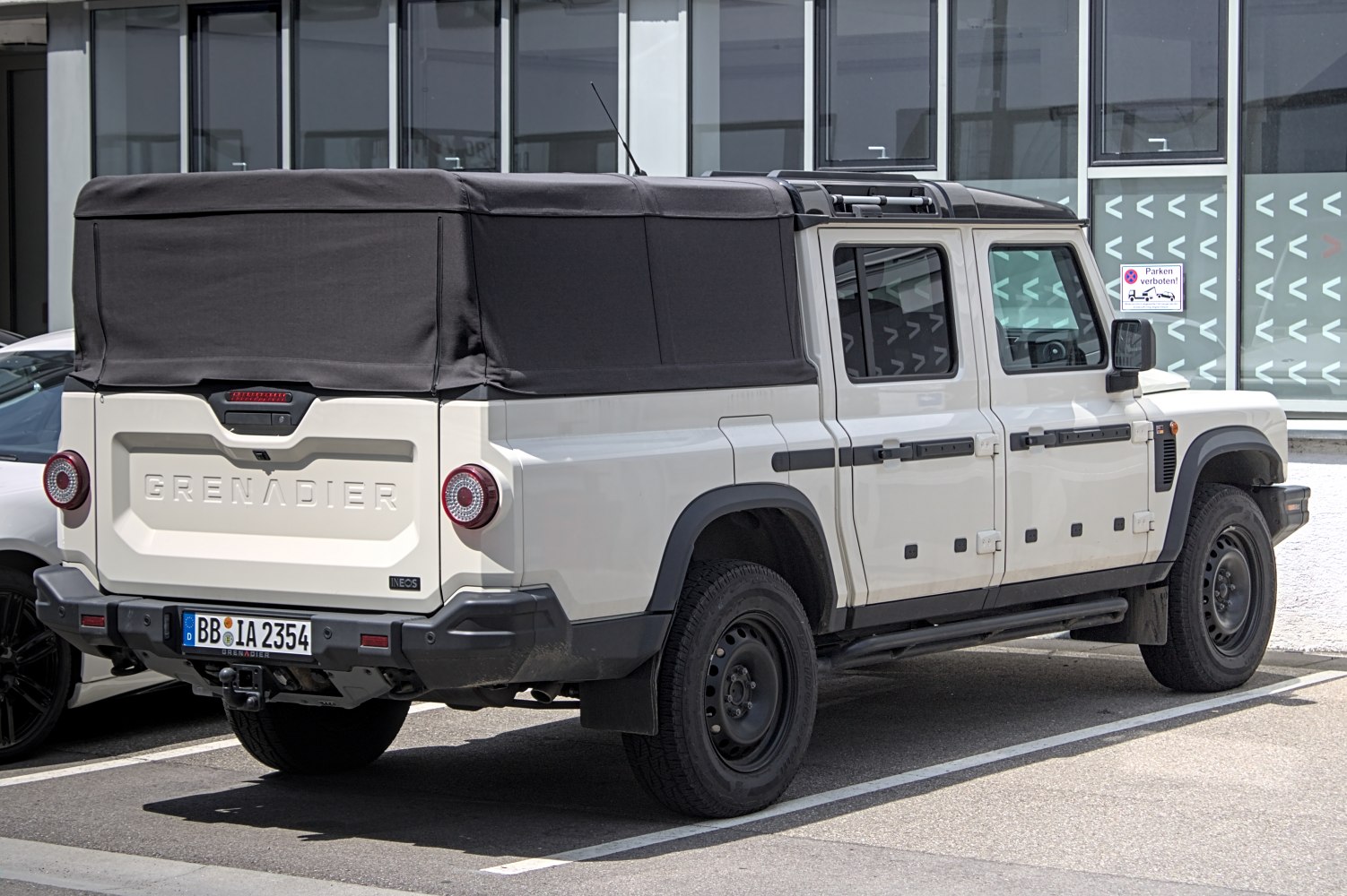 Pickup truck with soft fabric rear cover and rugged design