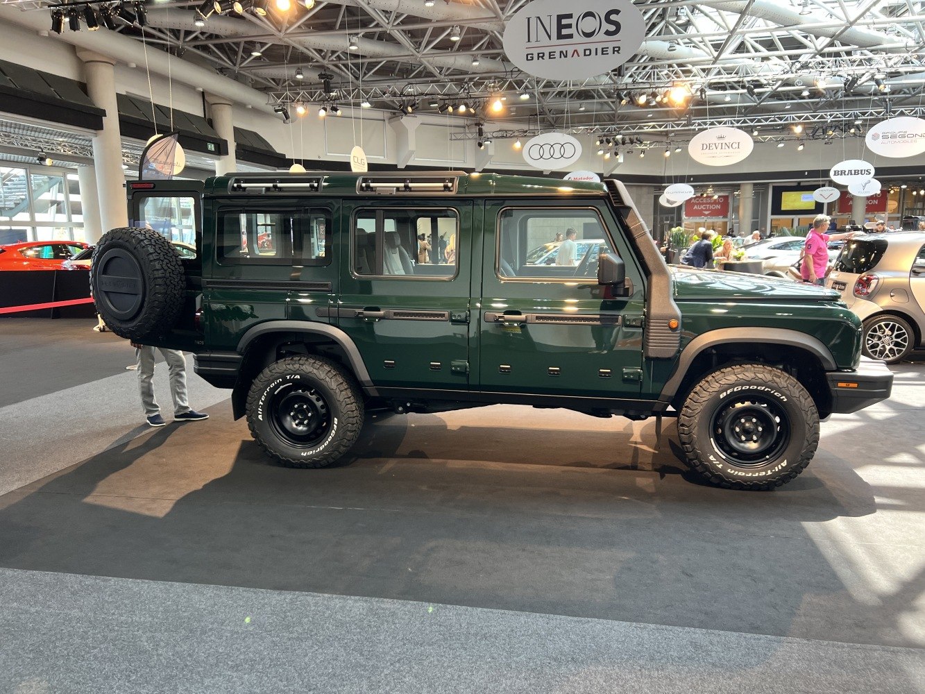 Rugged off-road SUV with roof rack and spare tire