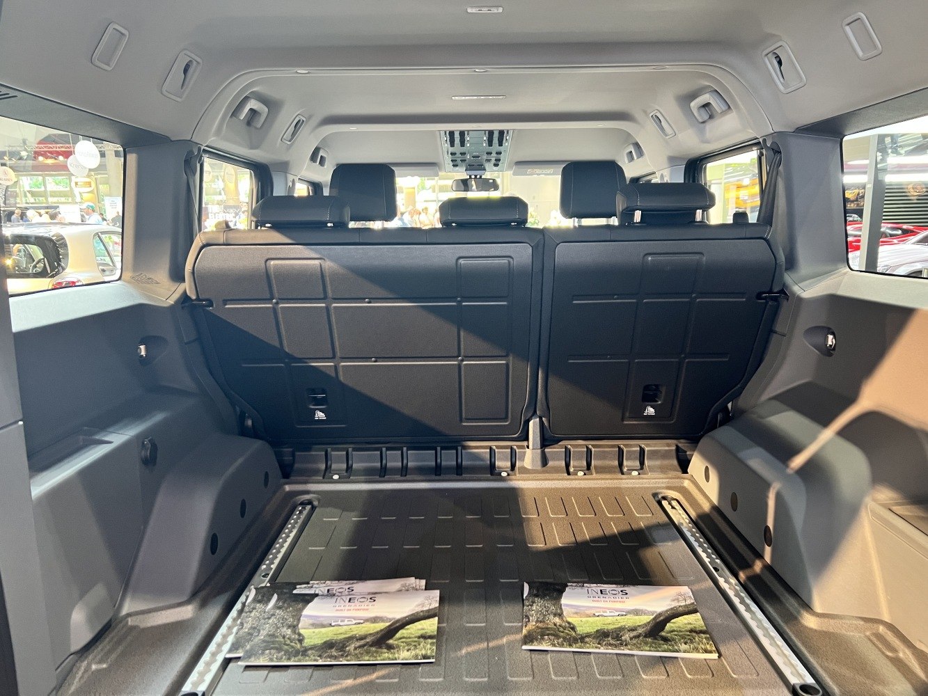 Spacious cargo area and rear seats in a rugged SUV interior