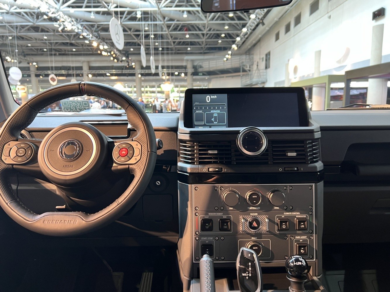 Dashboard, multifunction steering wheel, digital display, climate control knobs