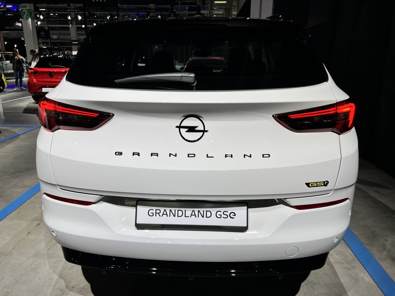 Modern rear design with distinctive LED taillights and rear windshield wiper.