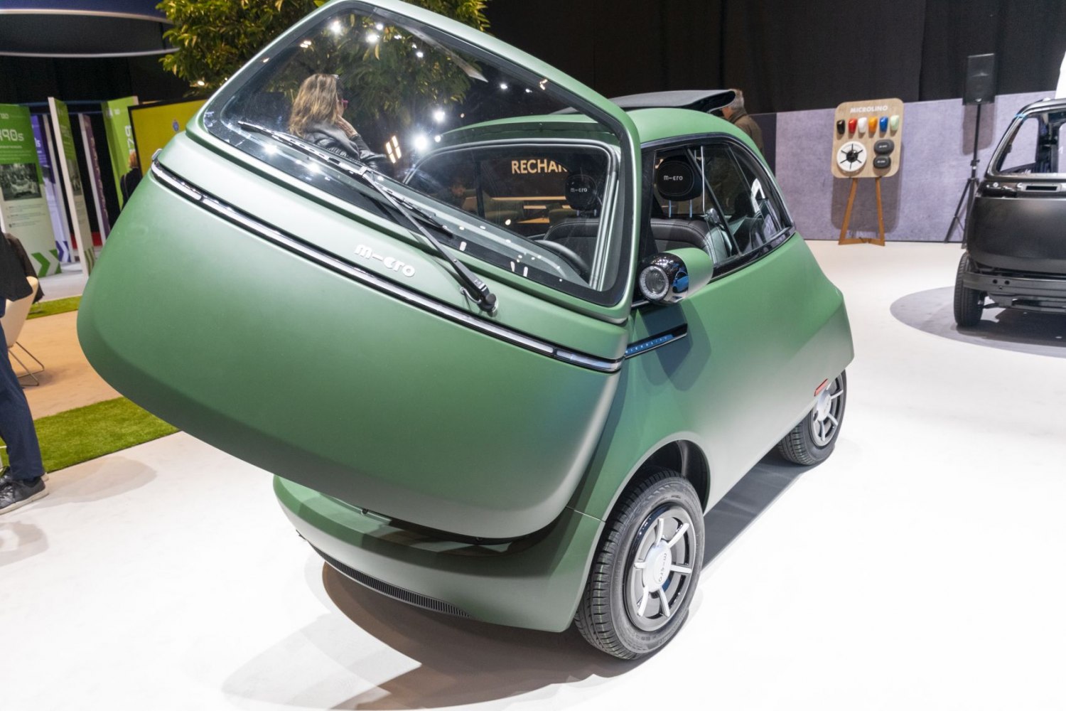 Compact microcar with unique front-hinged door