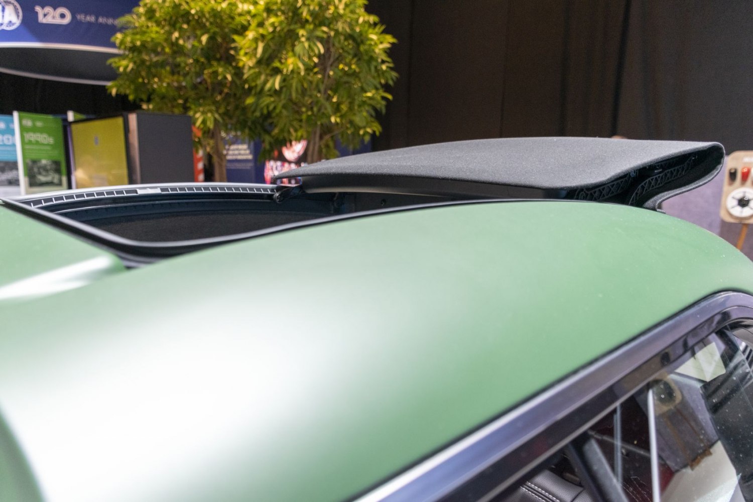 Convertible soft top roof in folded storage position