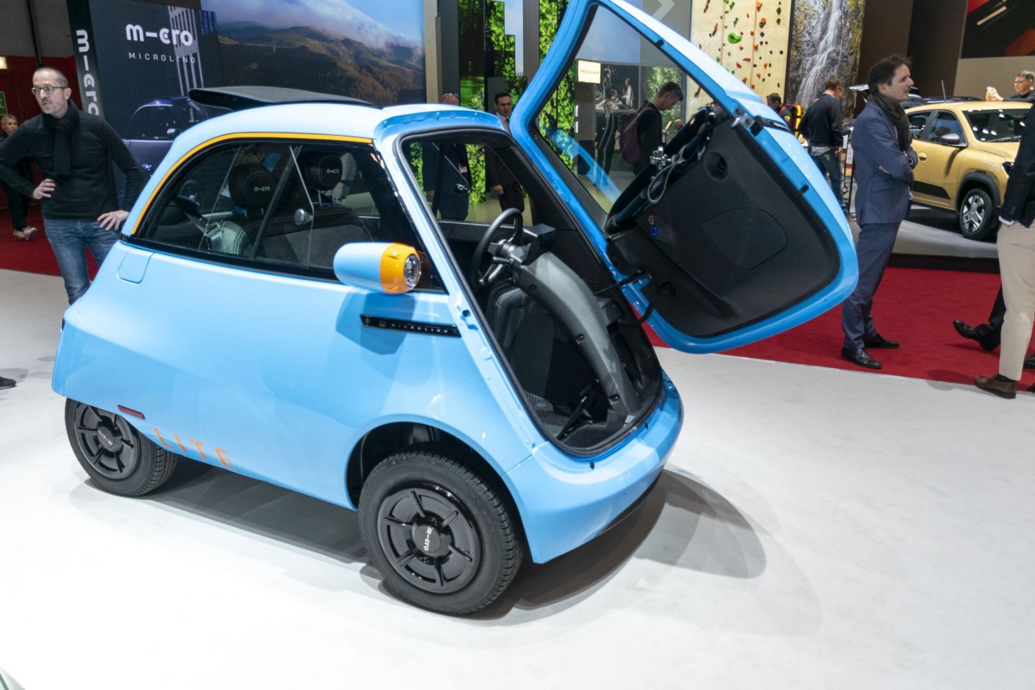 Compact light blue micro EV with unique front-opening door