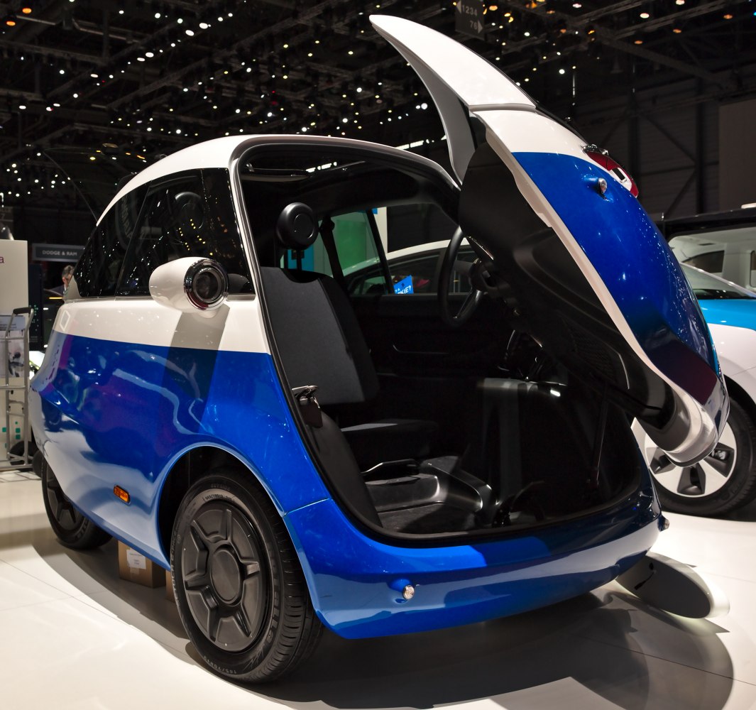 Compact electric vehicle with unique front-opening door