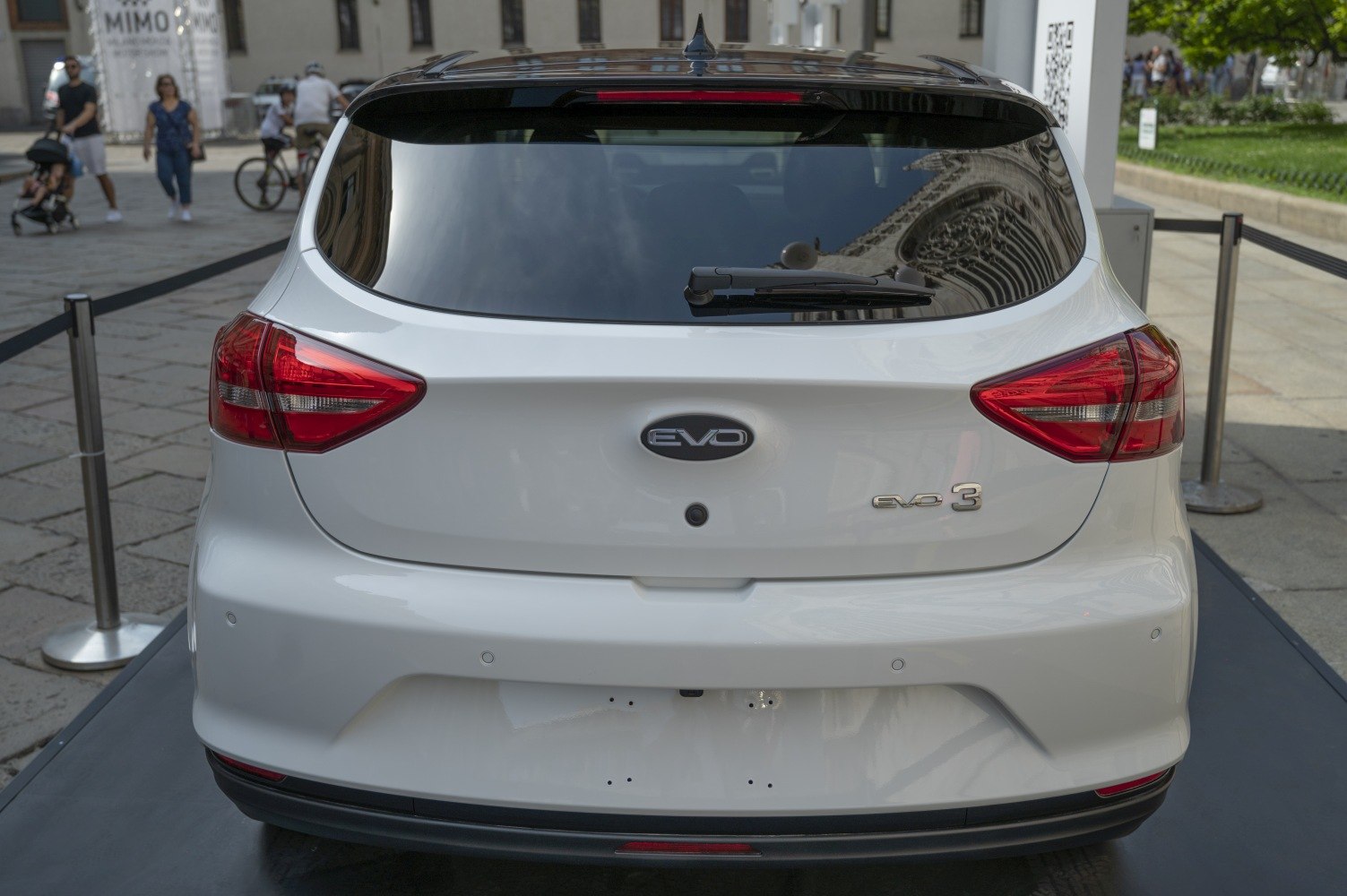 Rear view of modern hatchback with distinctive tail lights and rear windshield wiper
