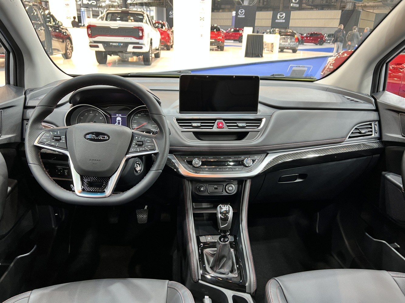 Digital dashboard with multifunction steering wheel and manual gear shifter