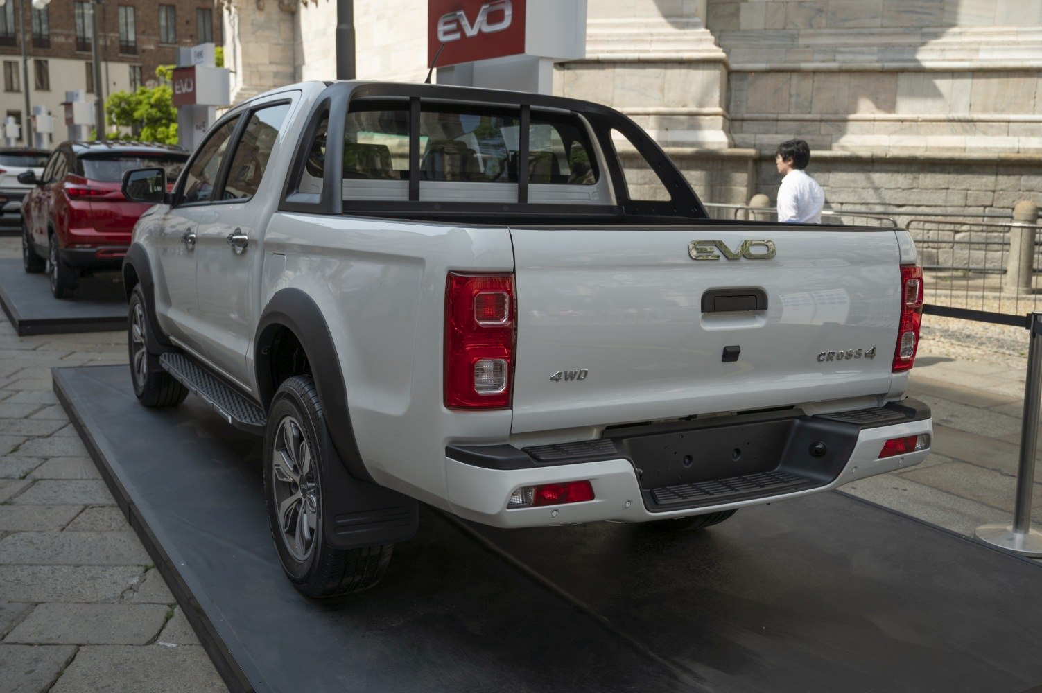 Rear view of 4WD pickup truck with rugged step board and stylish tail lights