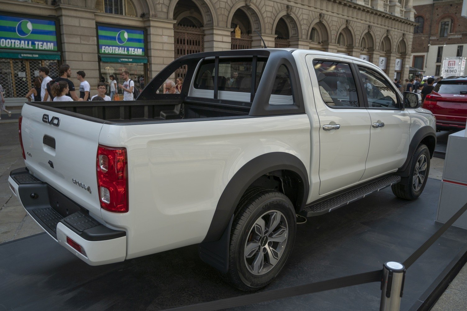 Pickup truck rear side with cargo bed and alloy wheels