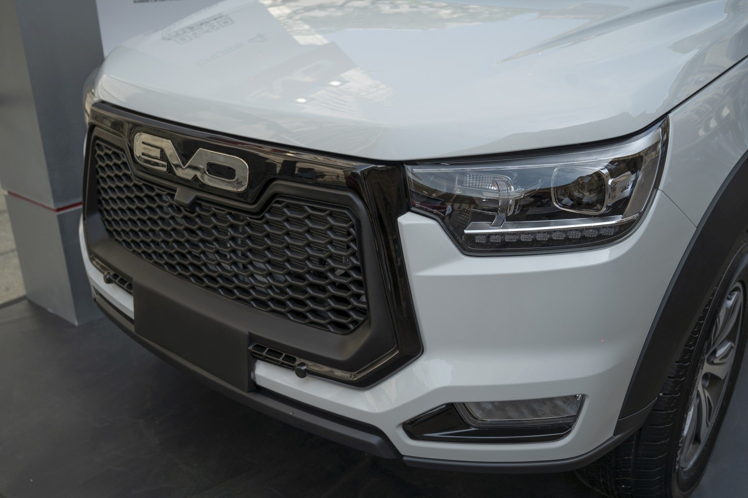 Close-up of front grille and headlight with modern design