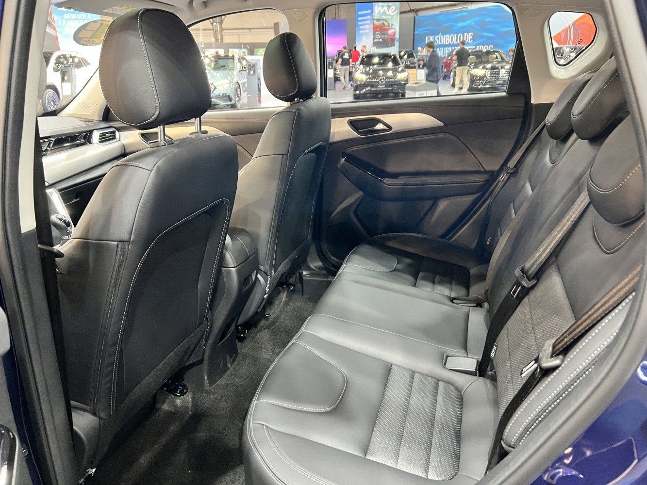 Spacious rear seating with leather upholstery and detailed stitching
