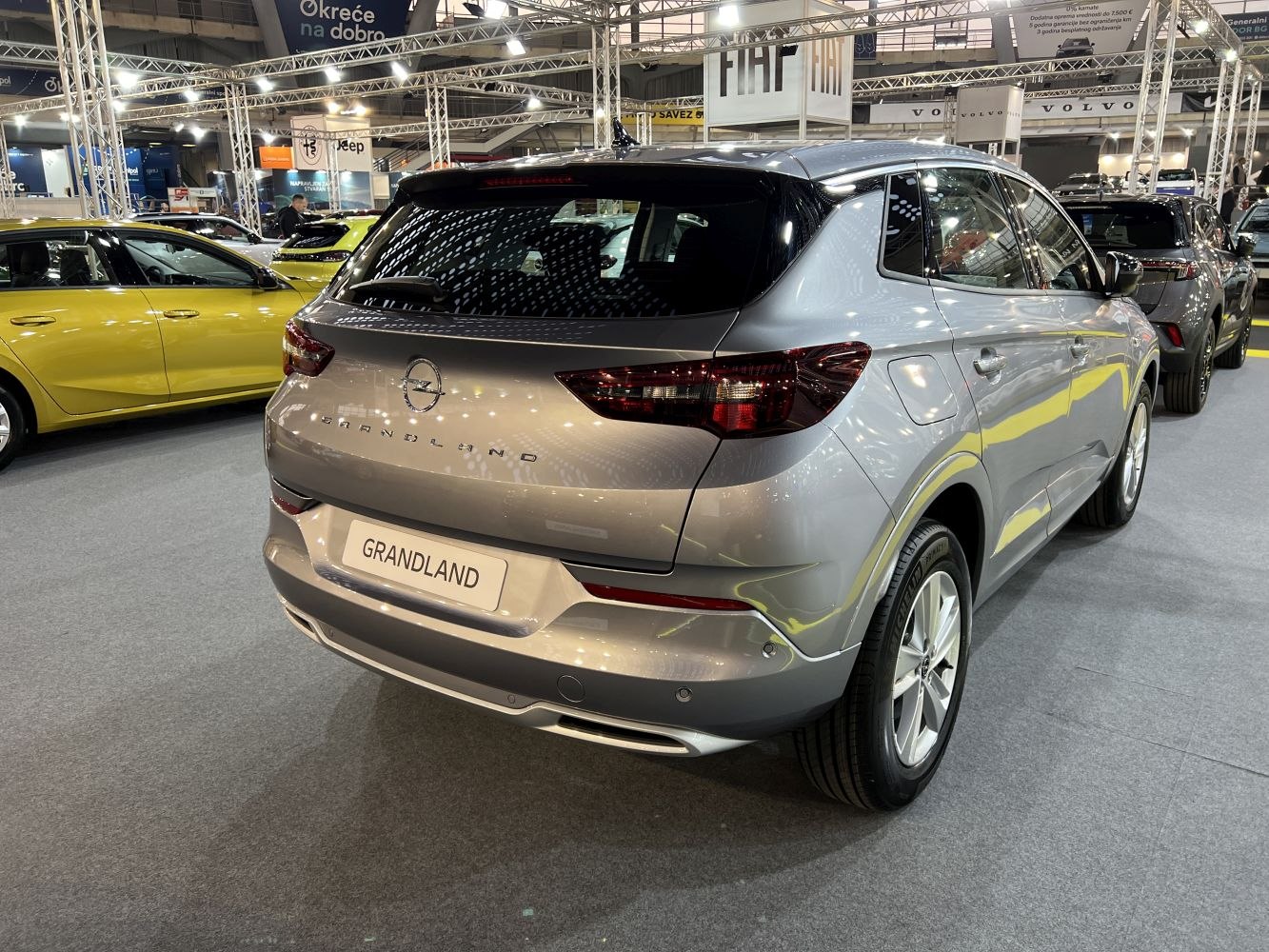 Rear view of an SUV with sleek taillights and silver paint