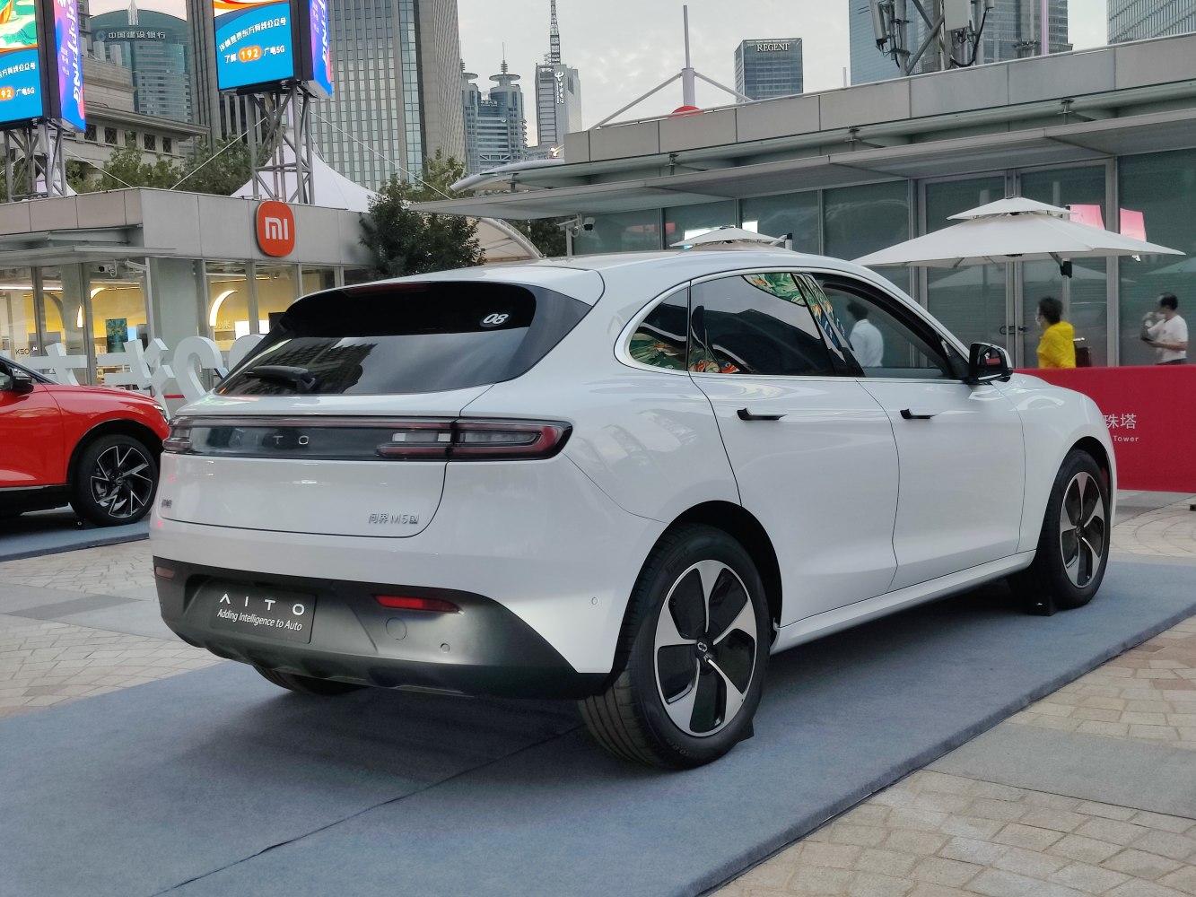 Rear and side view of modern SUV with sleek taillights and aerodynamic shape