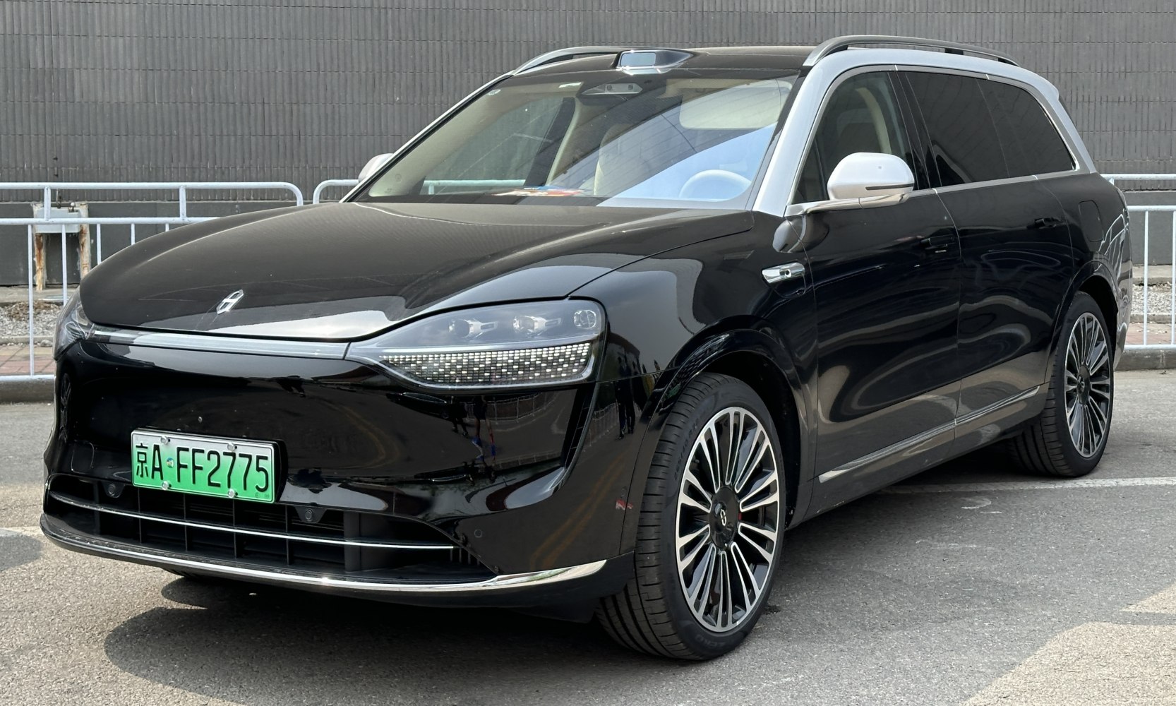 Sleek front fascia and detailed luxury alloy wheels