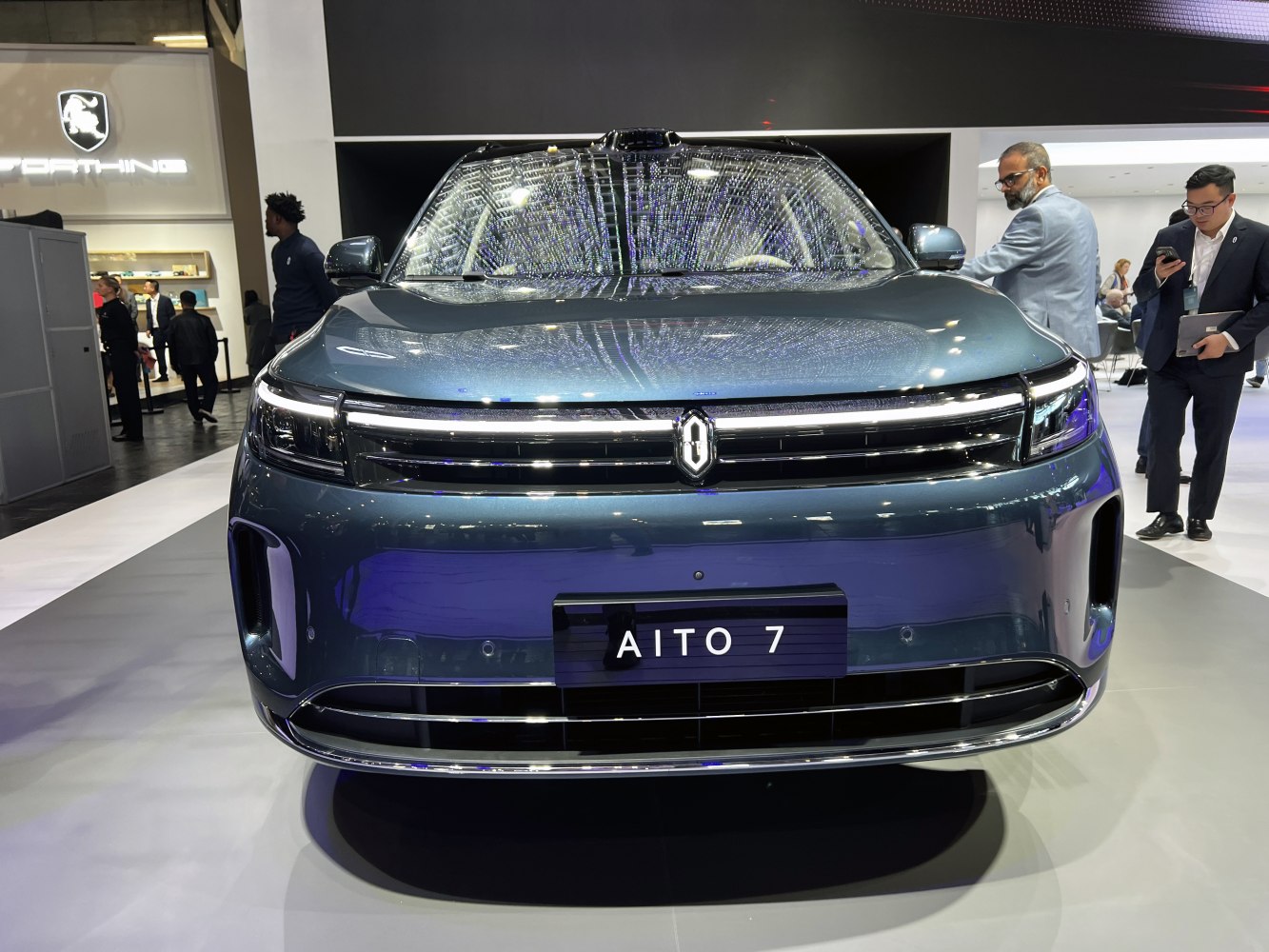 Front view of a vehicle with LED headlights and modern grille
