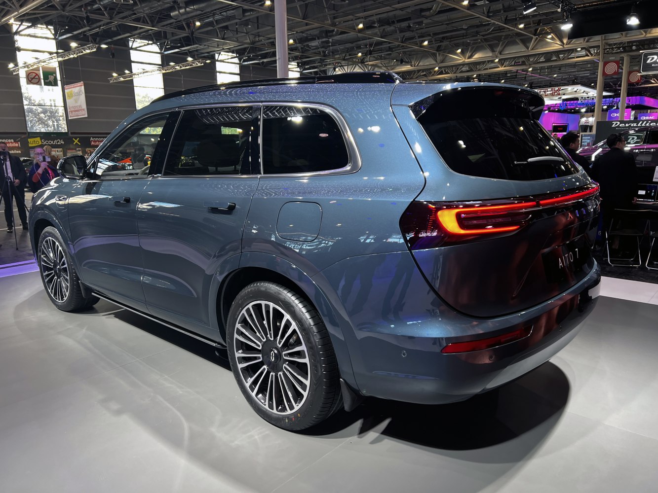 Rear and side views of sleek SUV with LED taillights and alloy wheels