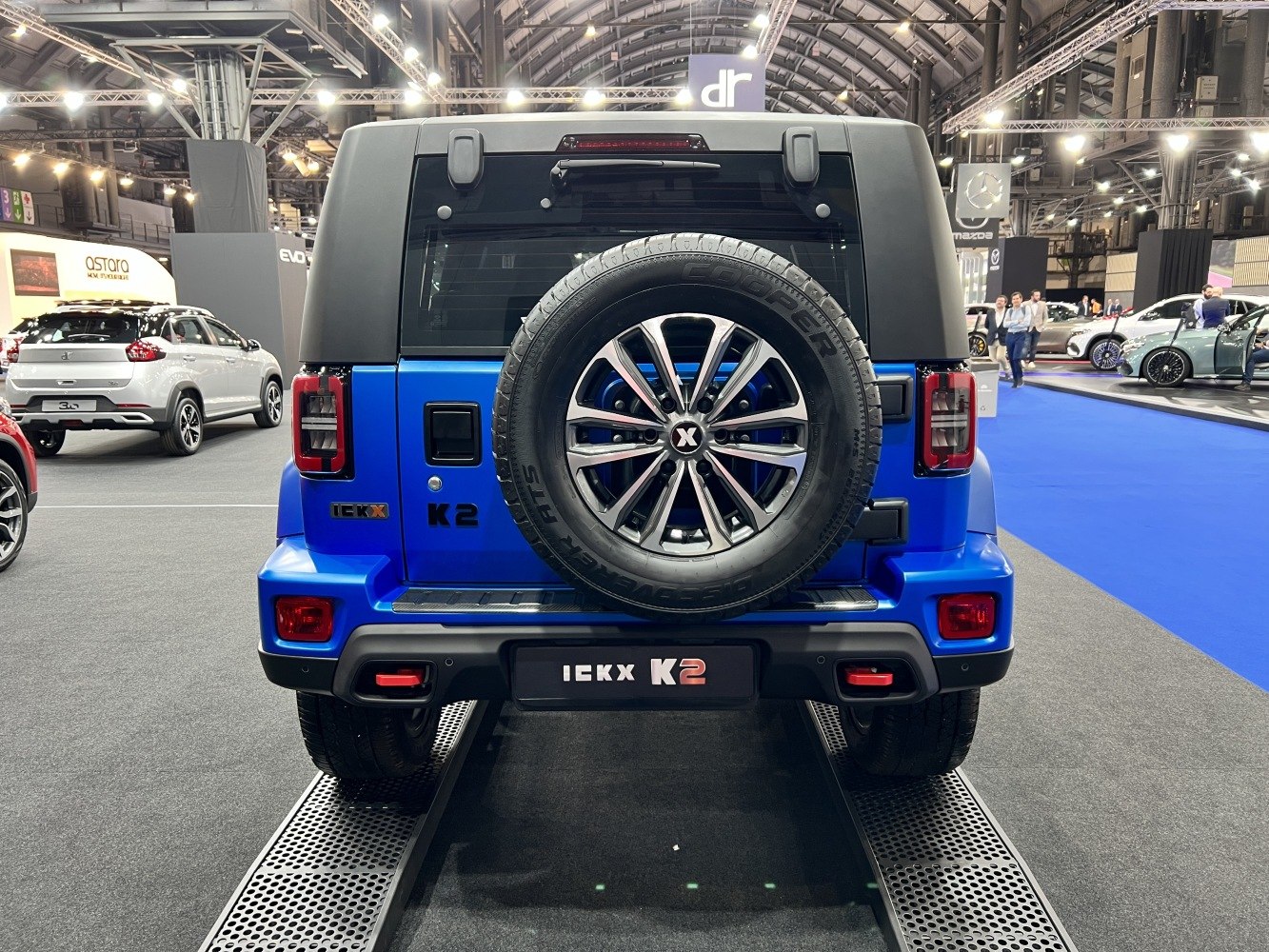 SUV rear with mounted spare tire and distinctive taillights