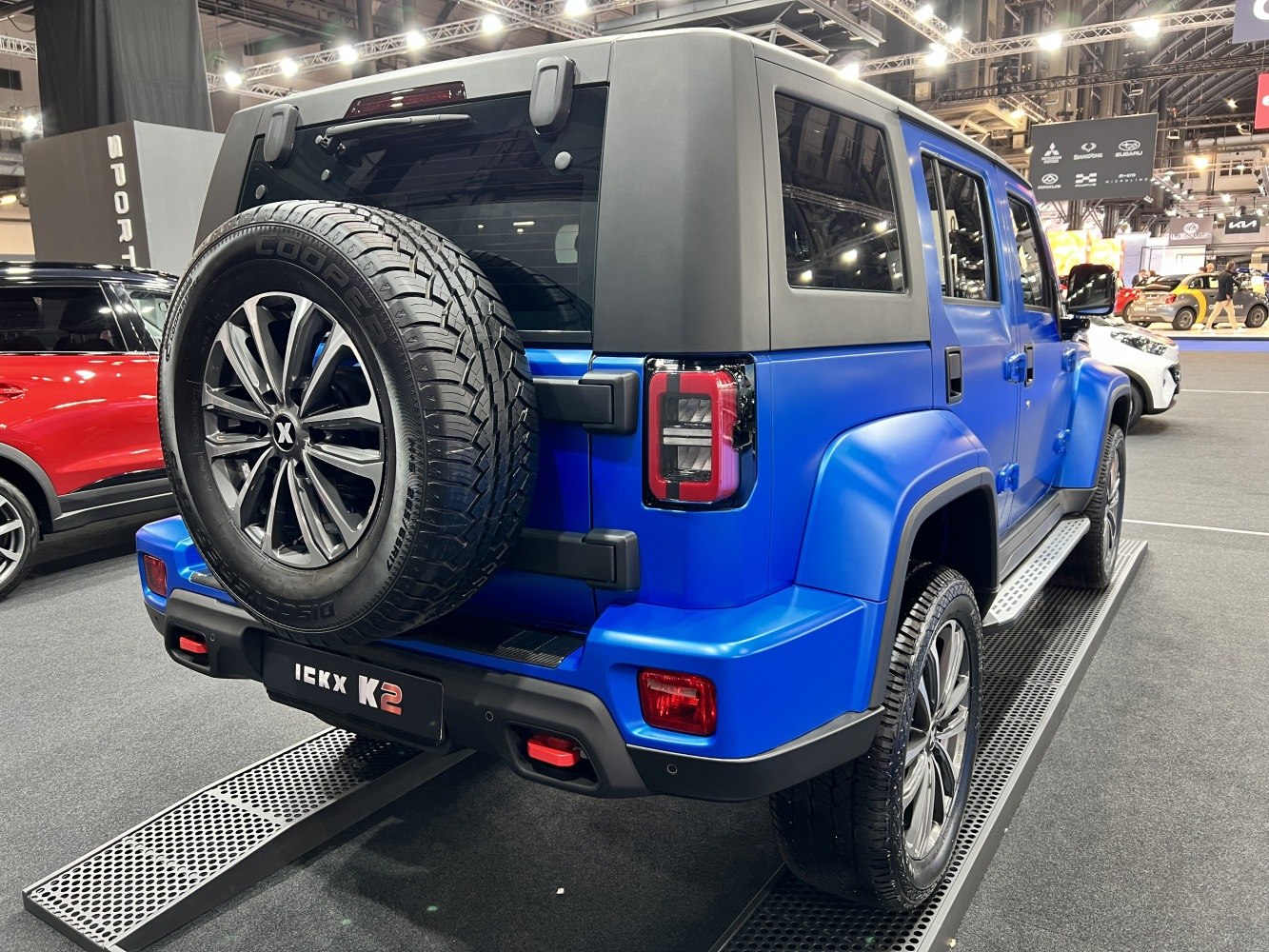 Rear view of SUV with spare tire and alloy wheels