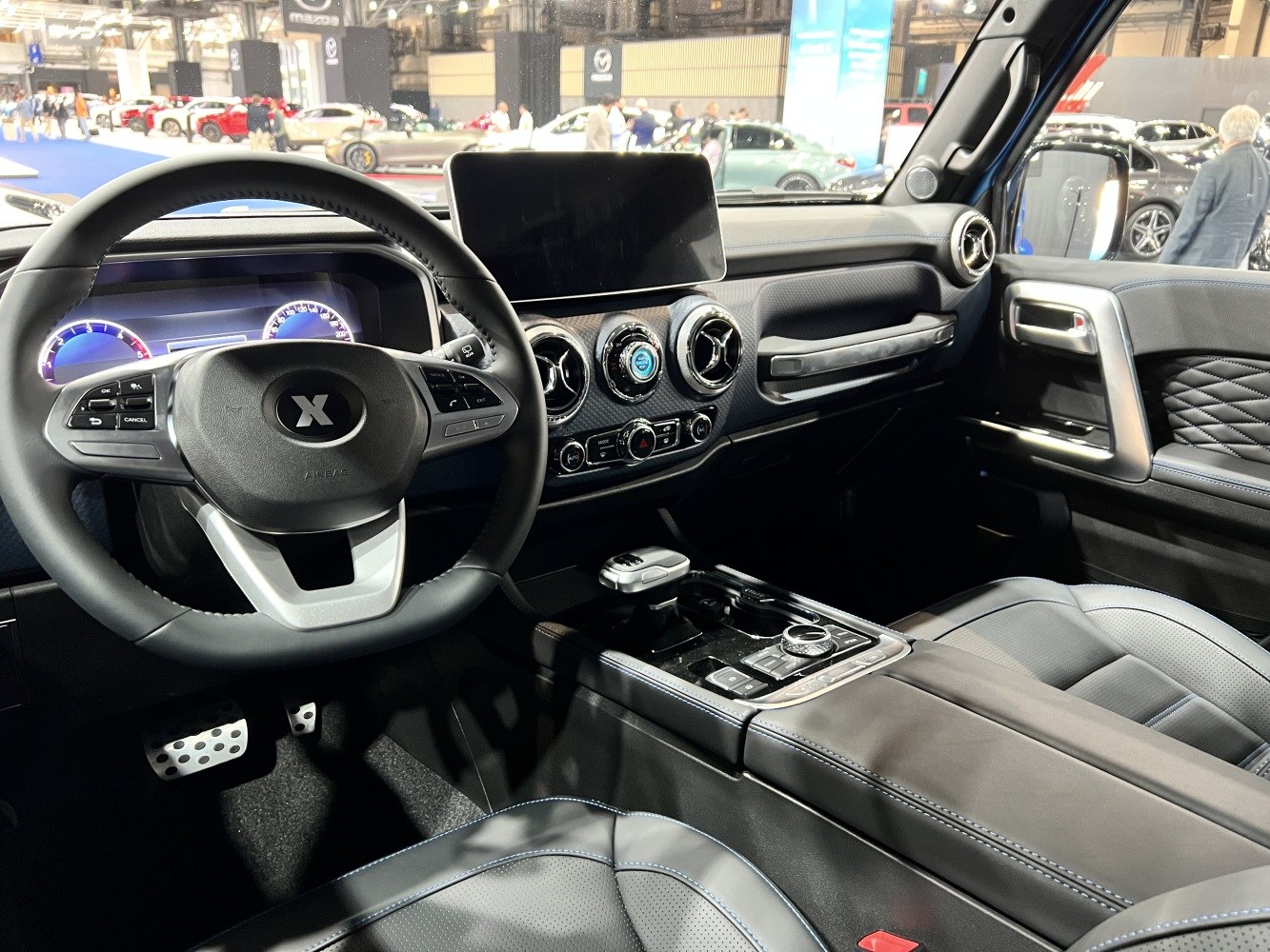 Modern car interior with digital dashboard and touchscreen display