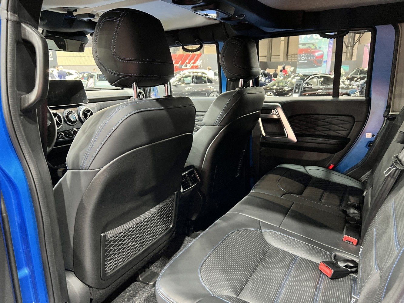 Spacious rear seats with premium leather upholstery and modern design elements