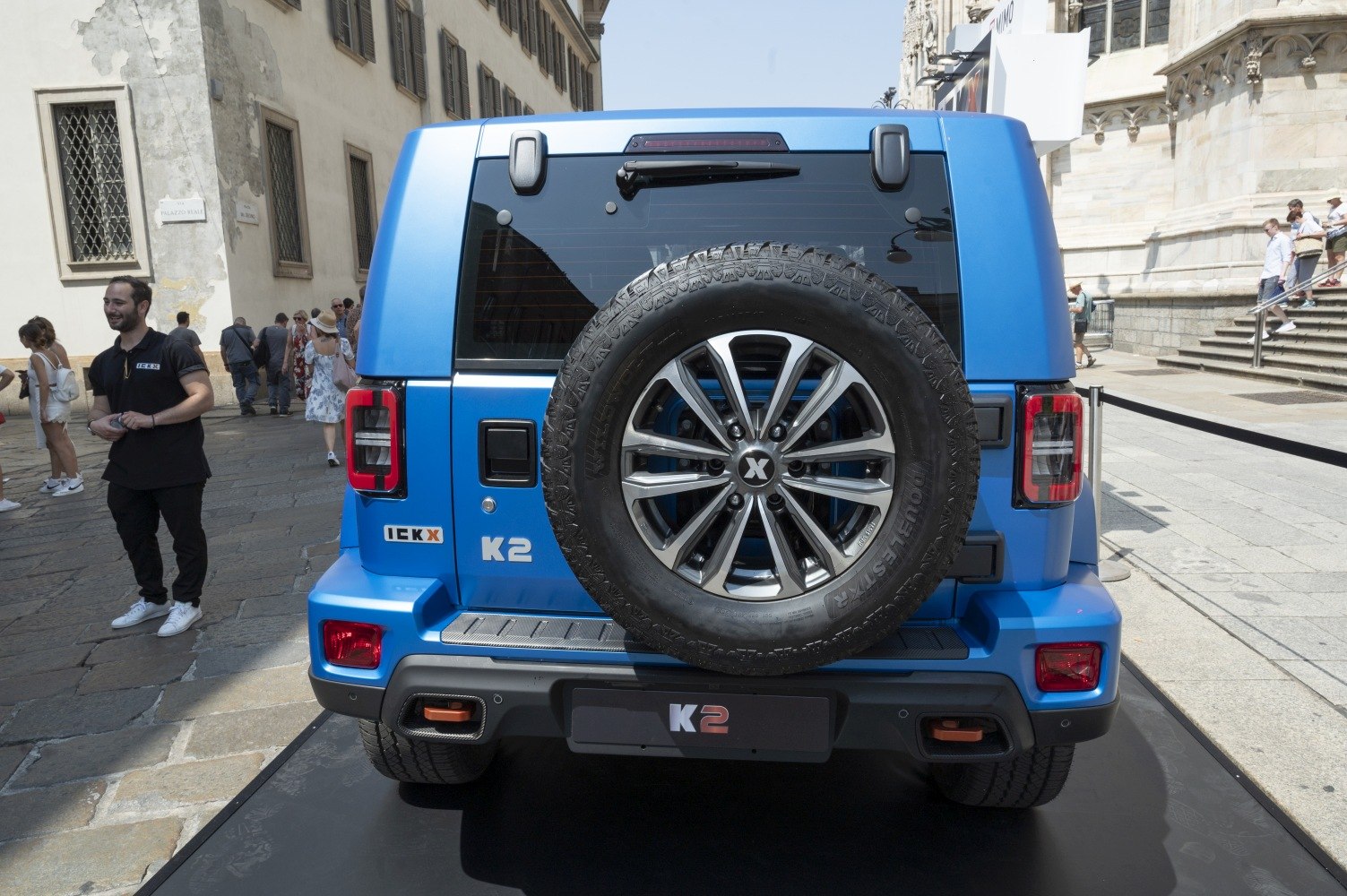 Rear view with mounted spare wheel and distinct tail lights