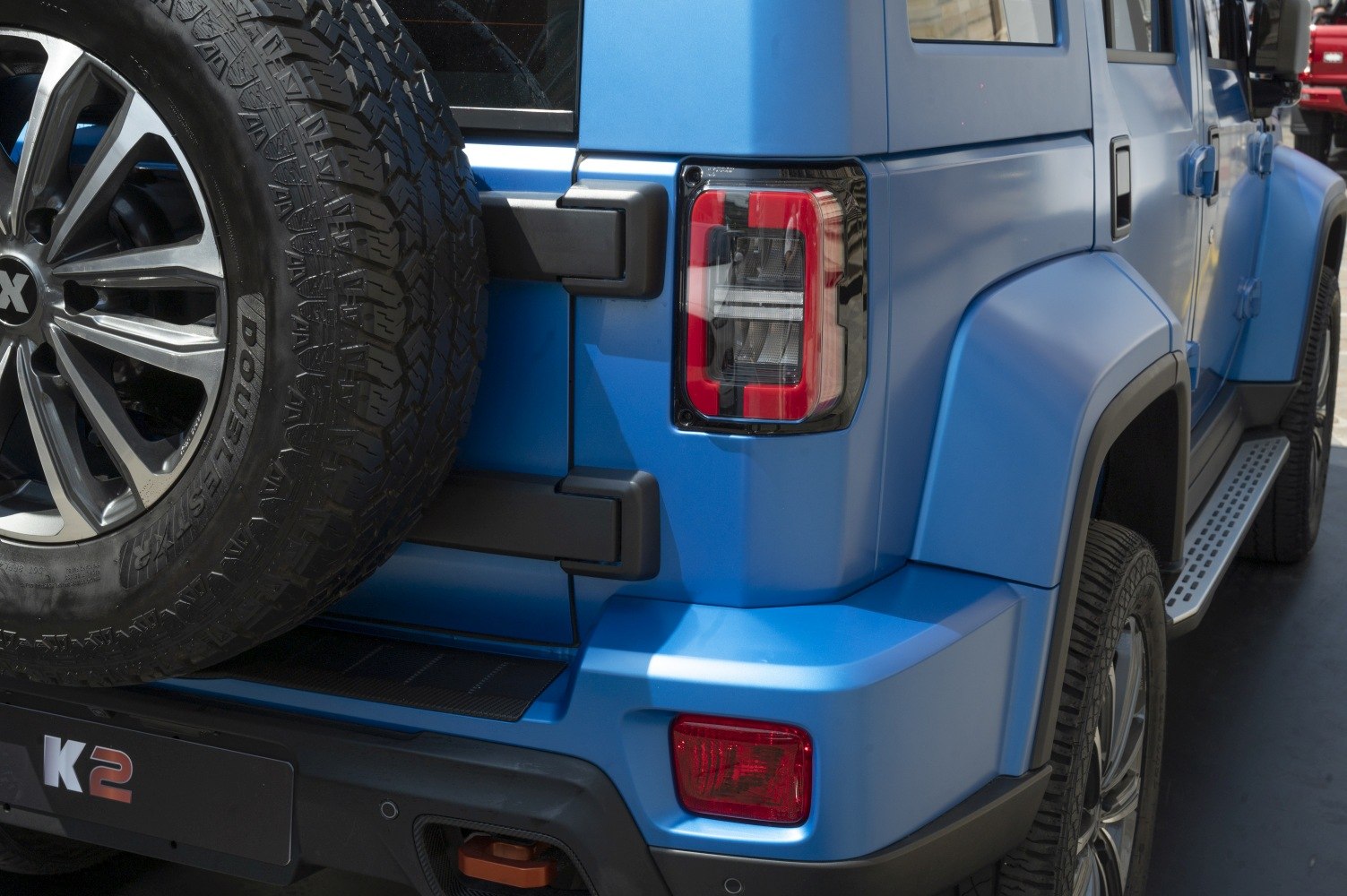 Rear side with spare tire and distinctive rear light design