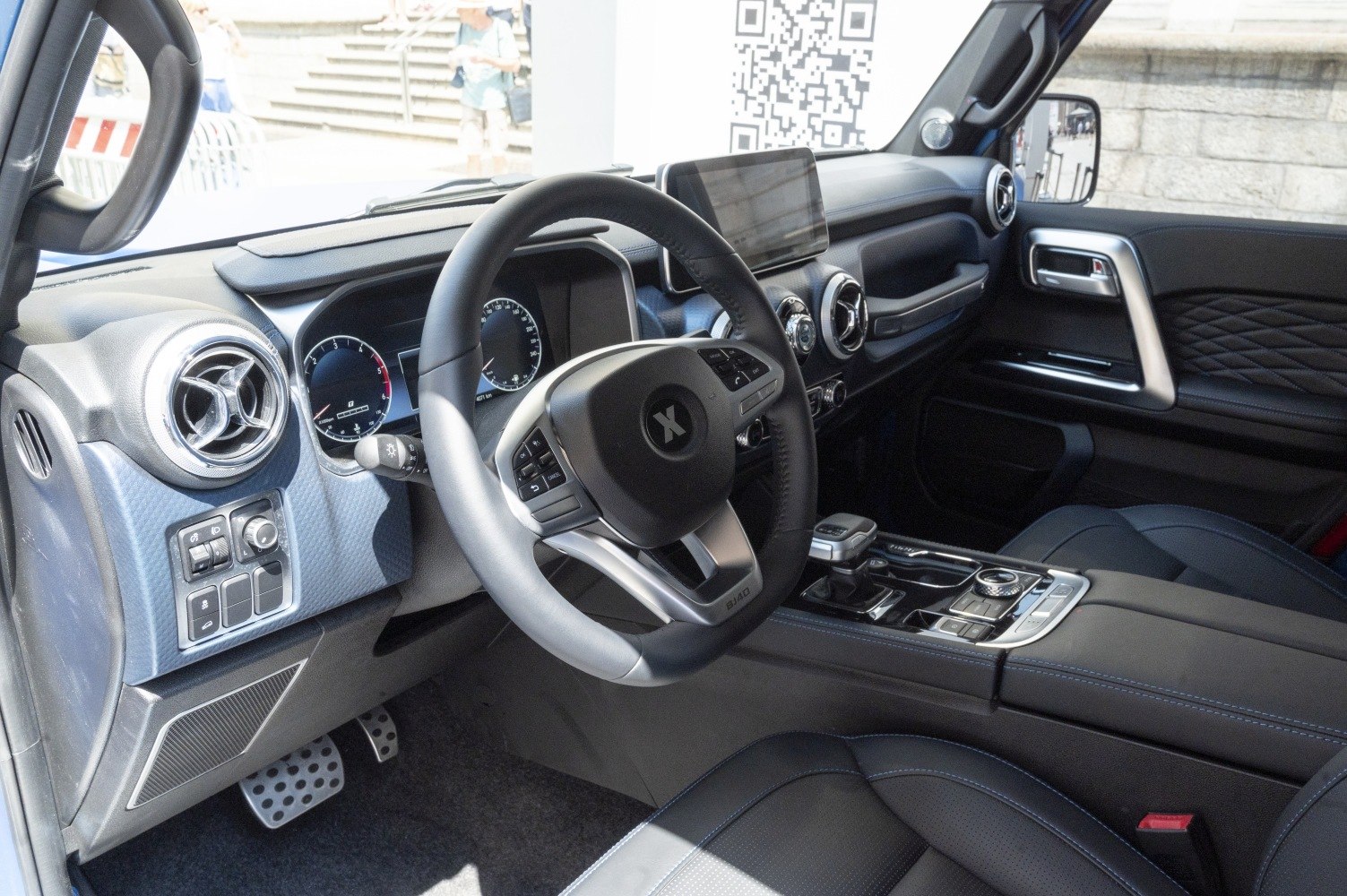 Modern car interior with multifunction steering wheel and digital dashboard