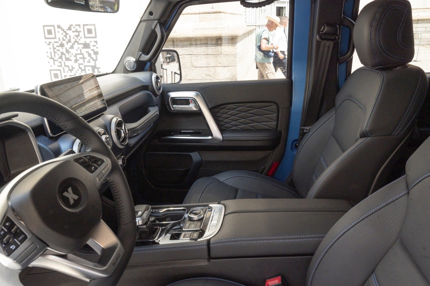 Modern dashboard and touchscreen with leather seats interior