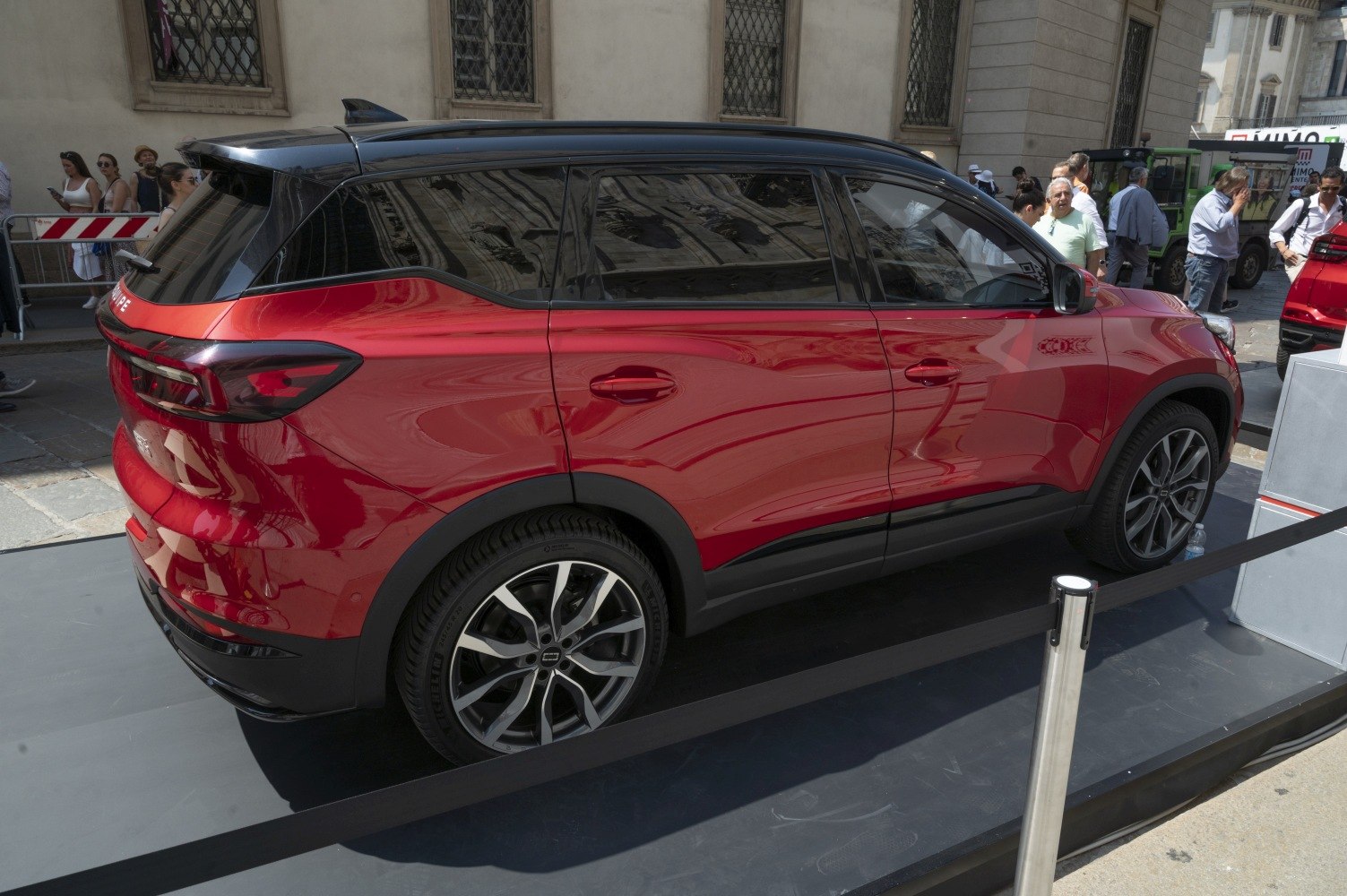 Two-tone SUV rear side with alloy wheels and tinted windows