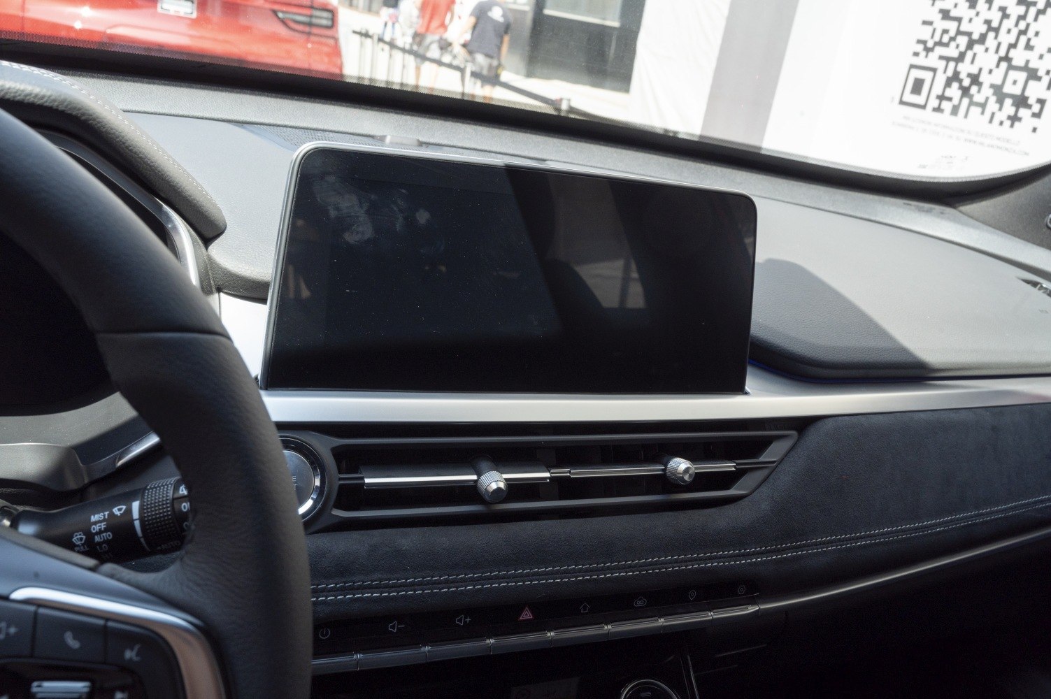 Modern dashboard with touchscreen display and air vents