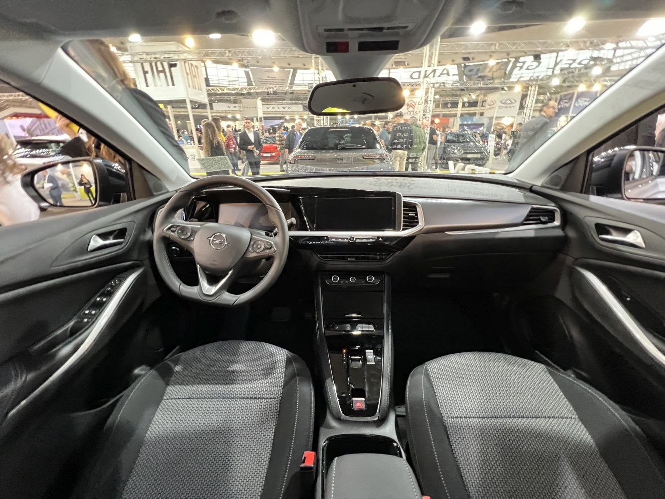 Digital dashboard and touchscreen infotainment with modern steering wheel