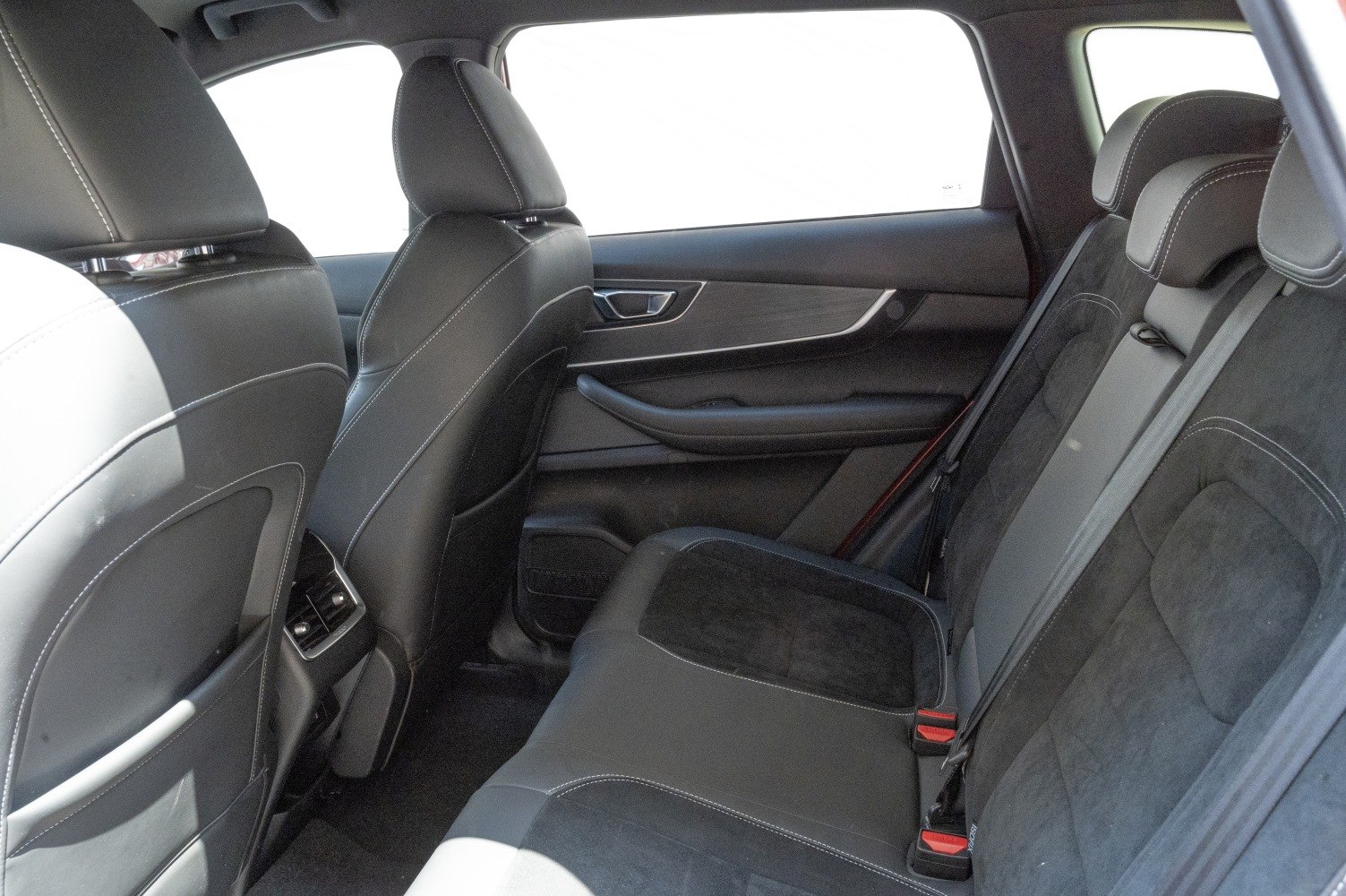 Rear seating area with premium upholstery and door panel details
