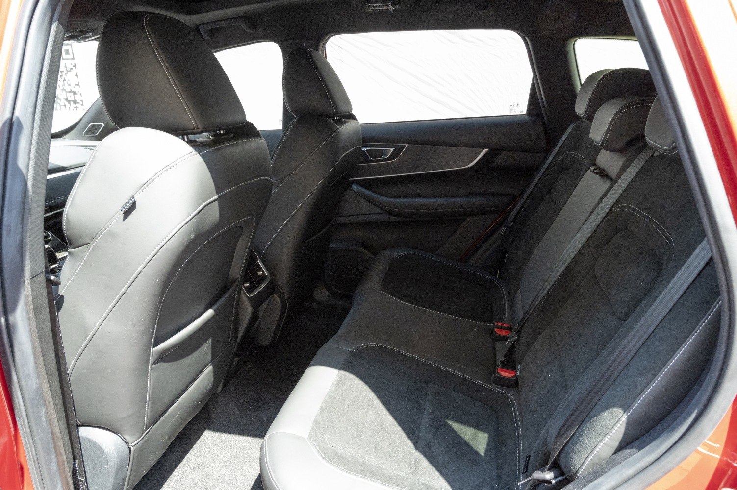 Black leather and suede rear seats with spacious legroom and rear air vents