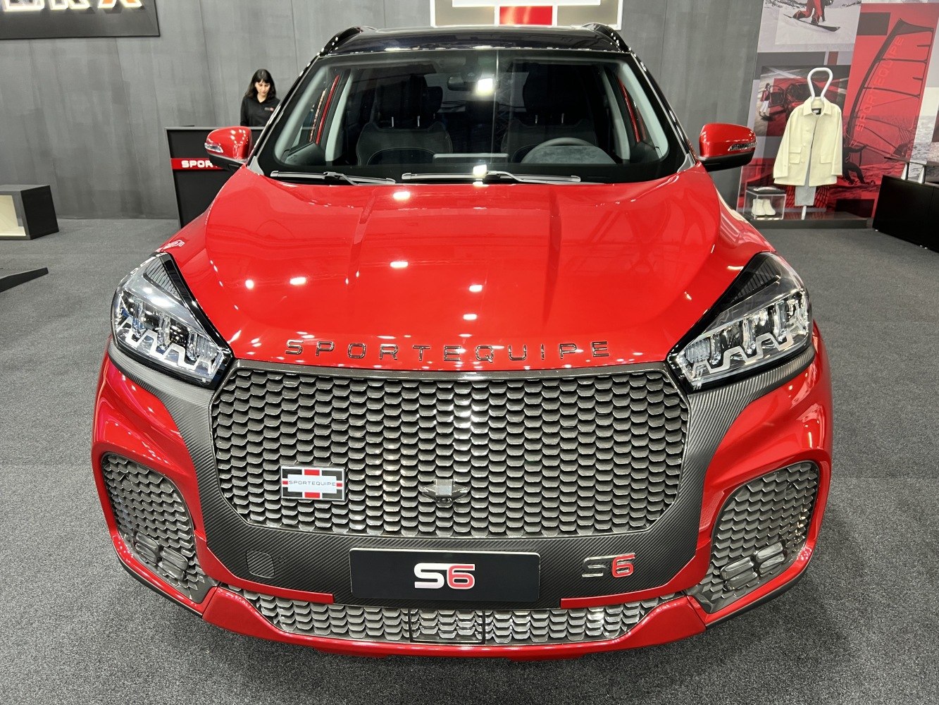Bold front grille and modern headlights of a sporty vehicle