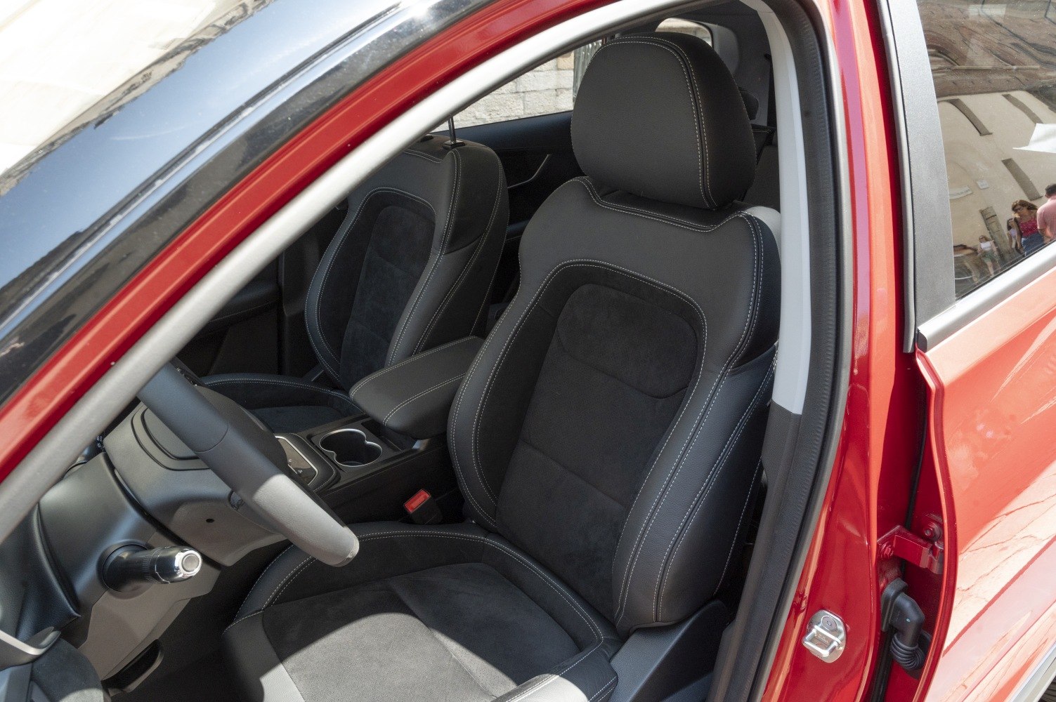 Premium black leather and suede car seats with contrast stitching