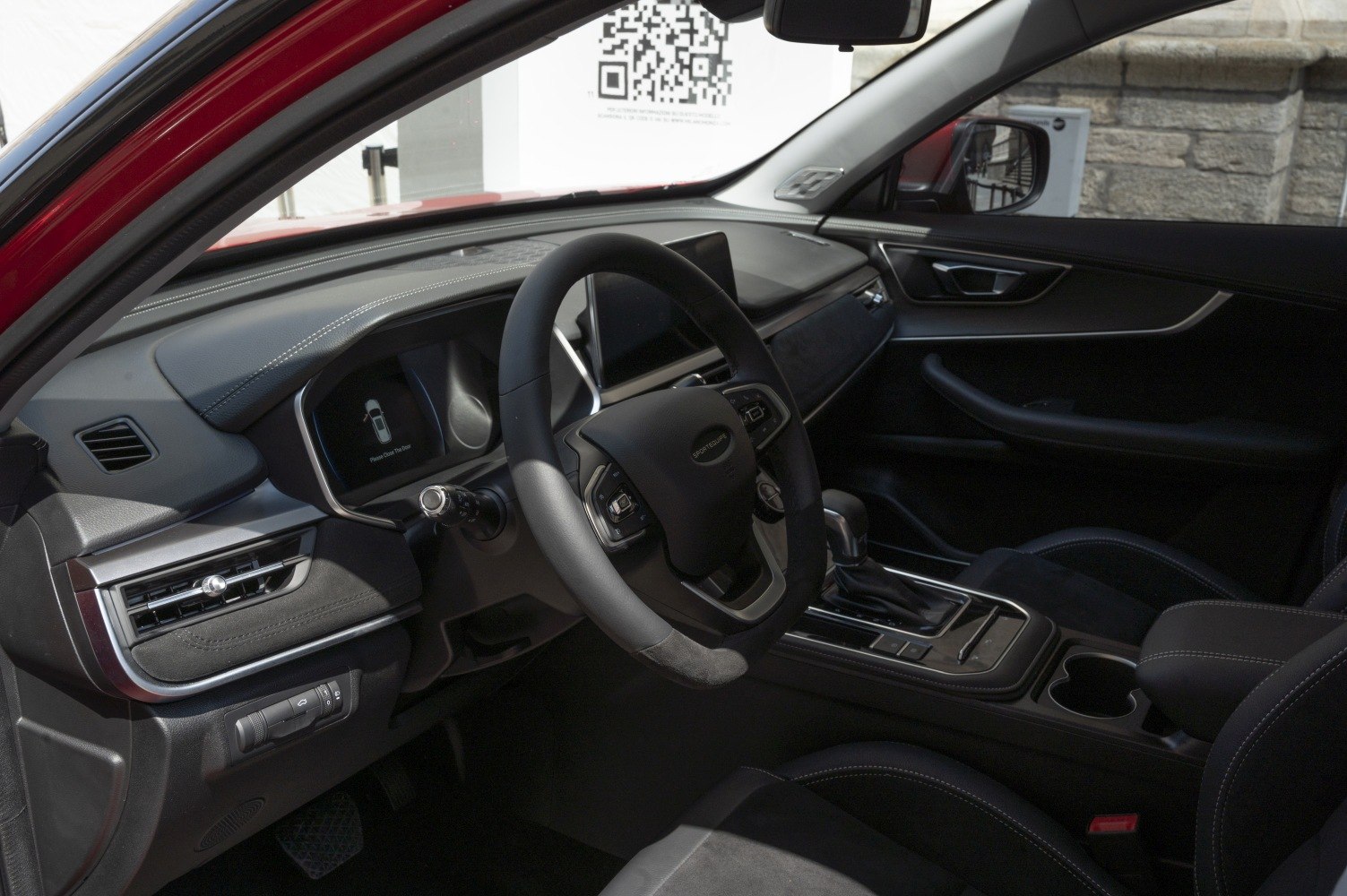 Modern dashboard with multifunction steering wheel and digital displays
