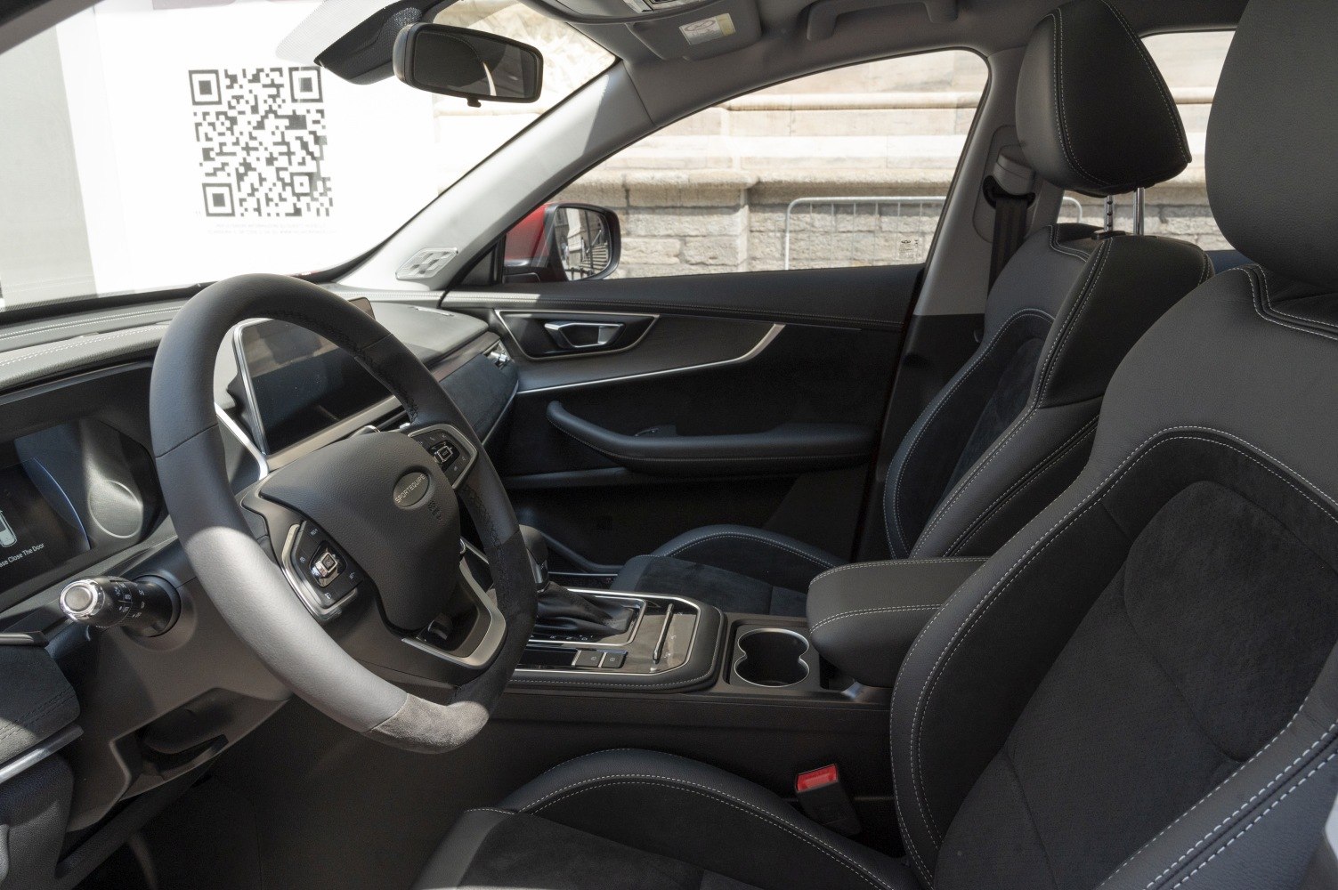 Modern interior with multifunction steering wheel and digital dashboard