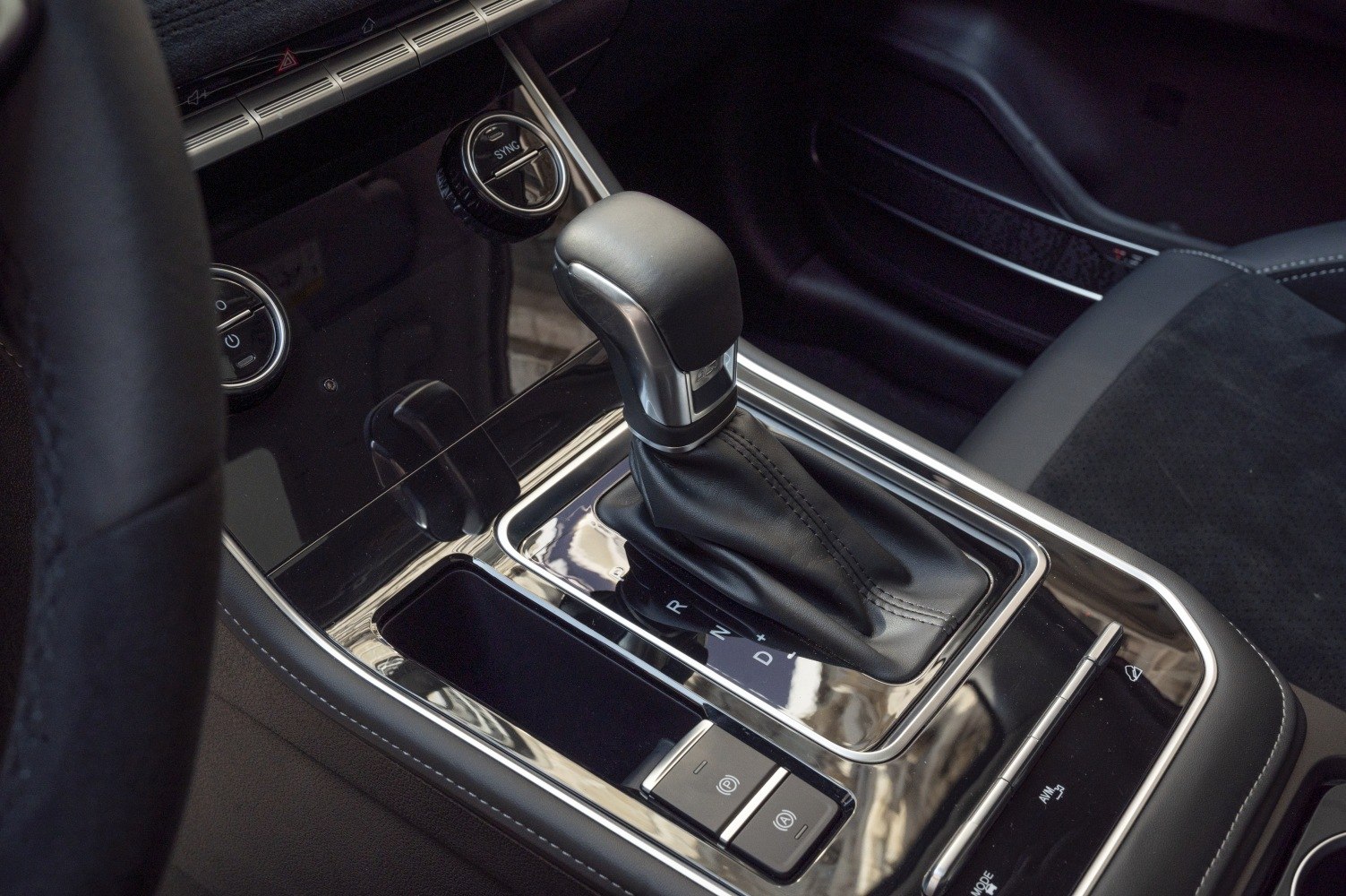 Automatic gear shift lever and center console controls