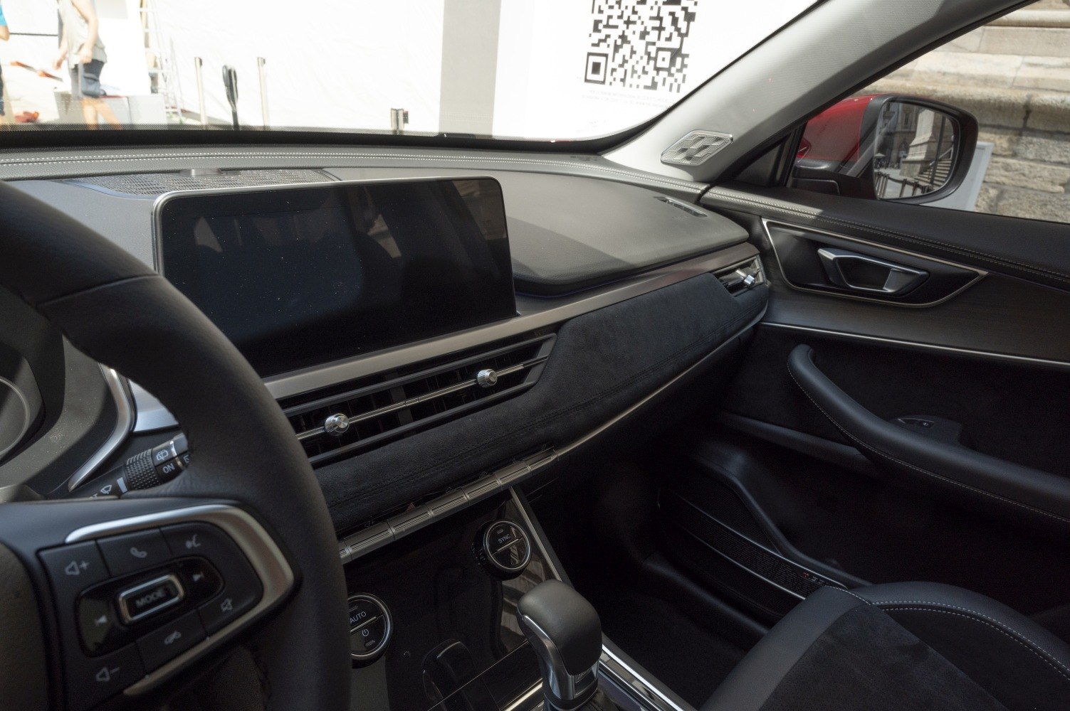 Digital dashboard and steering wheel controls with premium interior trim